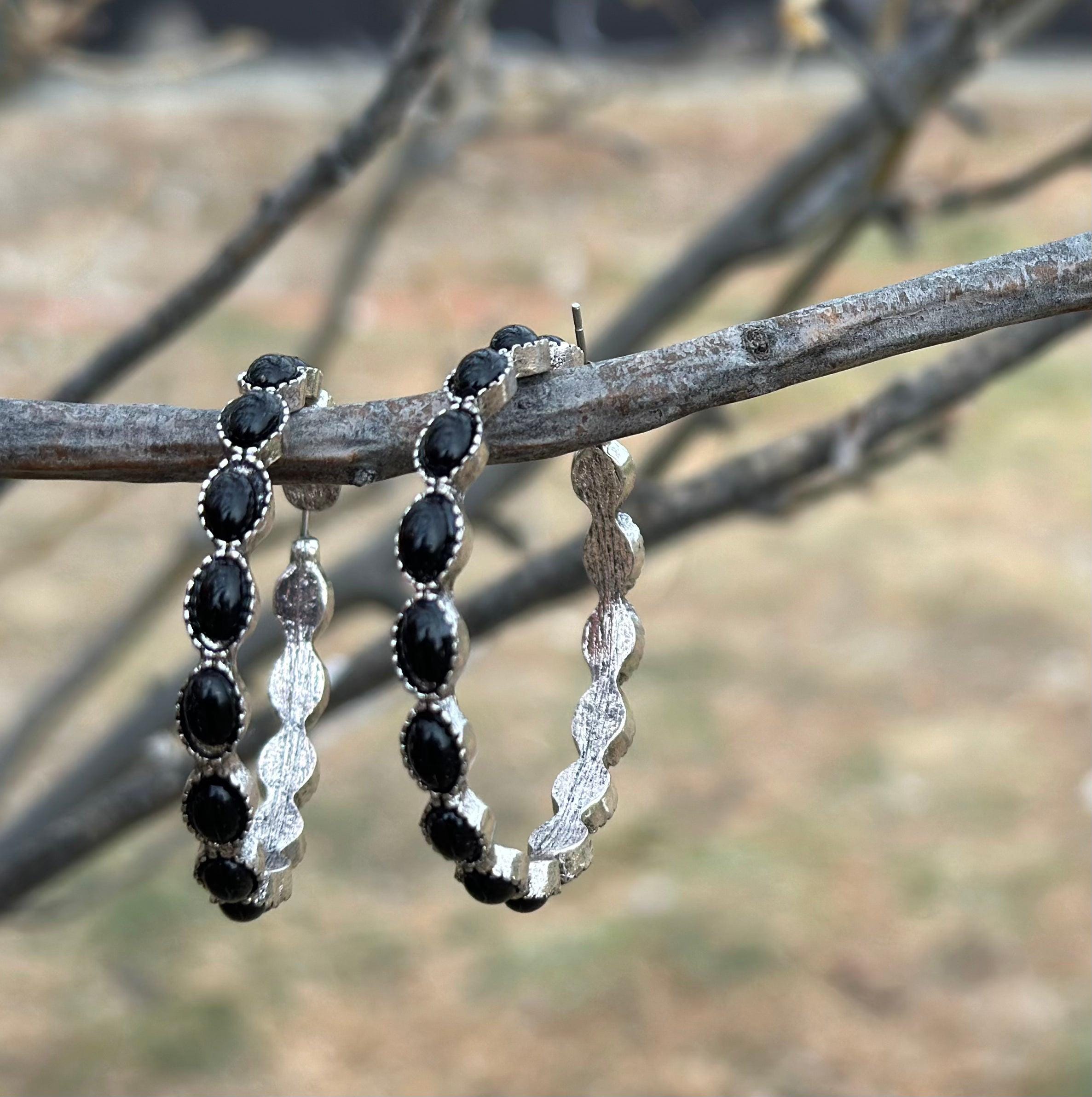Black Hoop Earrings 🖤 feature a stylish C-shape design, crafted from premium metals with a burnished silver finish. Large hoops are 1.8 inches round and are also available in turquoise, red, and pink! Earrings ship FREE with $35+ purchase