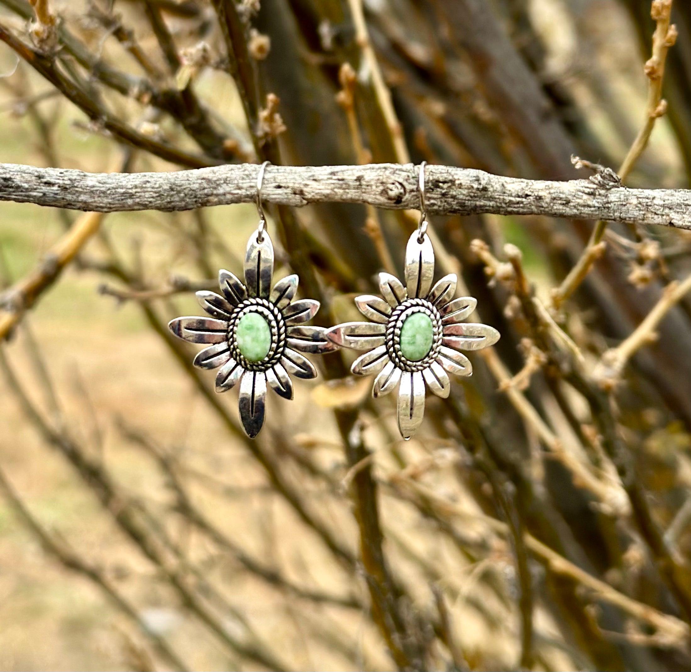 Light Green Earrings | WESTERN FLOWER Earrings | Western Dangle Earrings | Stamped Silver Earring | Cowgirl Earrings Featuring a delicate stamped silver floral design with a light green center stone. Ships FREE with $35+ purchase. Great Western Gift!