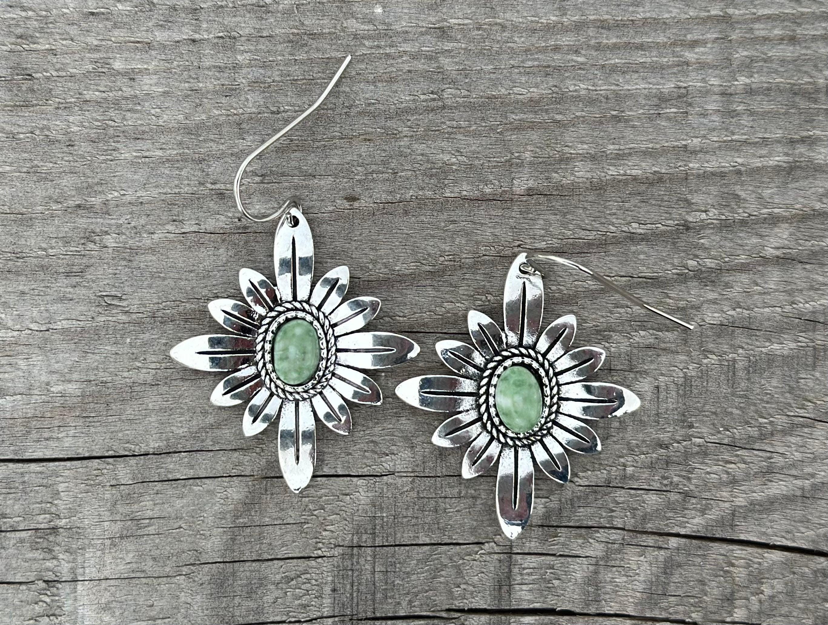 Light Green Earrings | WESTERN FLOWER Earrings | Western Dangle Earrings | Stamped Silver Earring | Cowgirl Earrings Featuring a delicate stamped silver floral design with a light green center stone. Ships FREE with $35+ purchase. Great Western Gift!