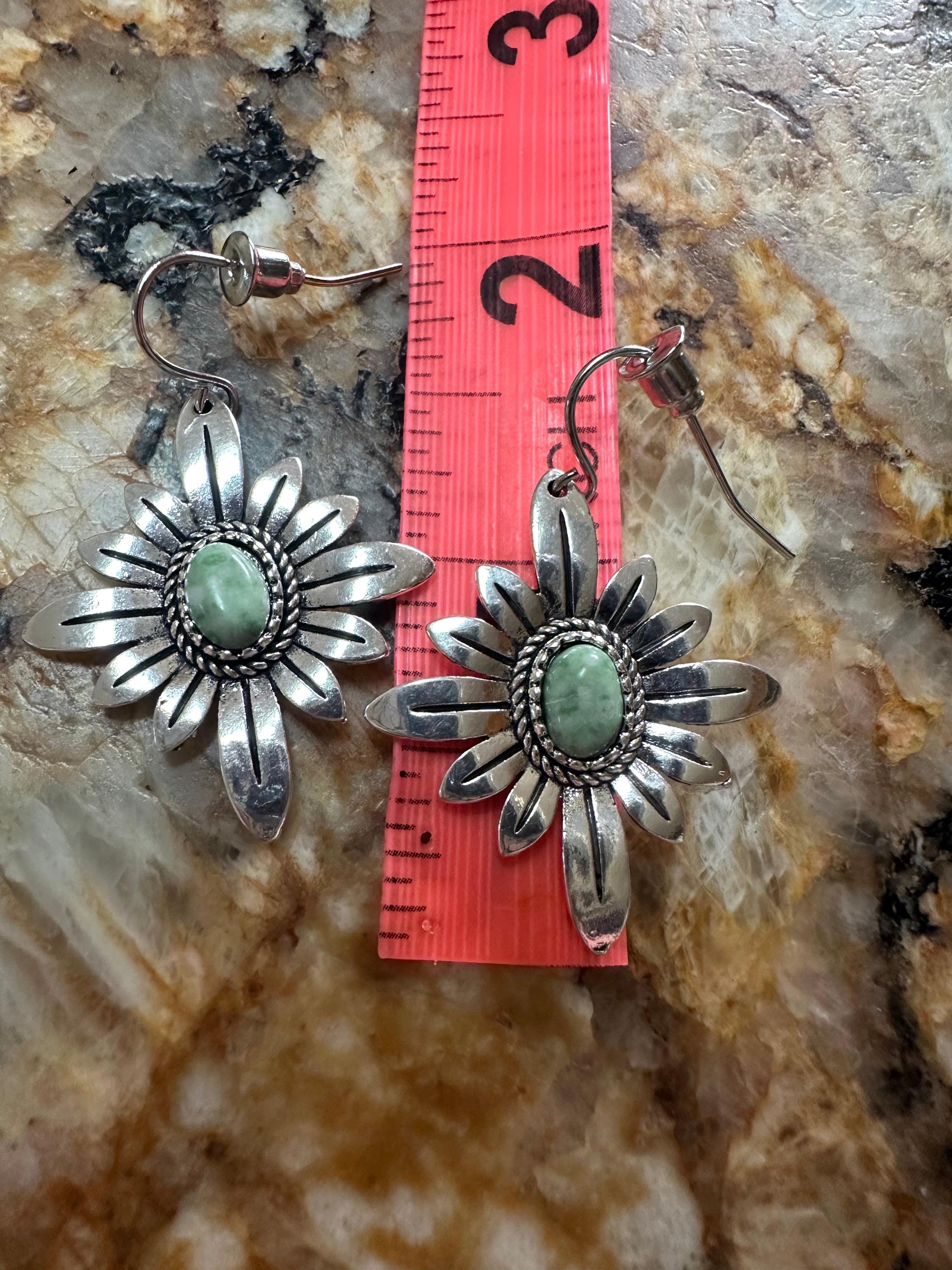 Light Green Earrings | WESTERN FLOWER Earrings | Western Dangle Earrings | Stamped Silver Earring | Cowgirl Earrings Featuring a delicate stamped silver floral design with a light green center stone. Ships FREE with $35+ purchase. Great Western Gift!
