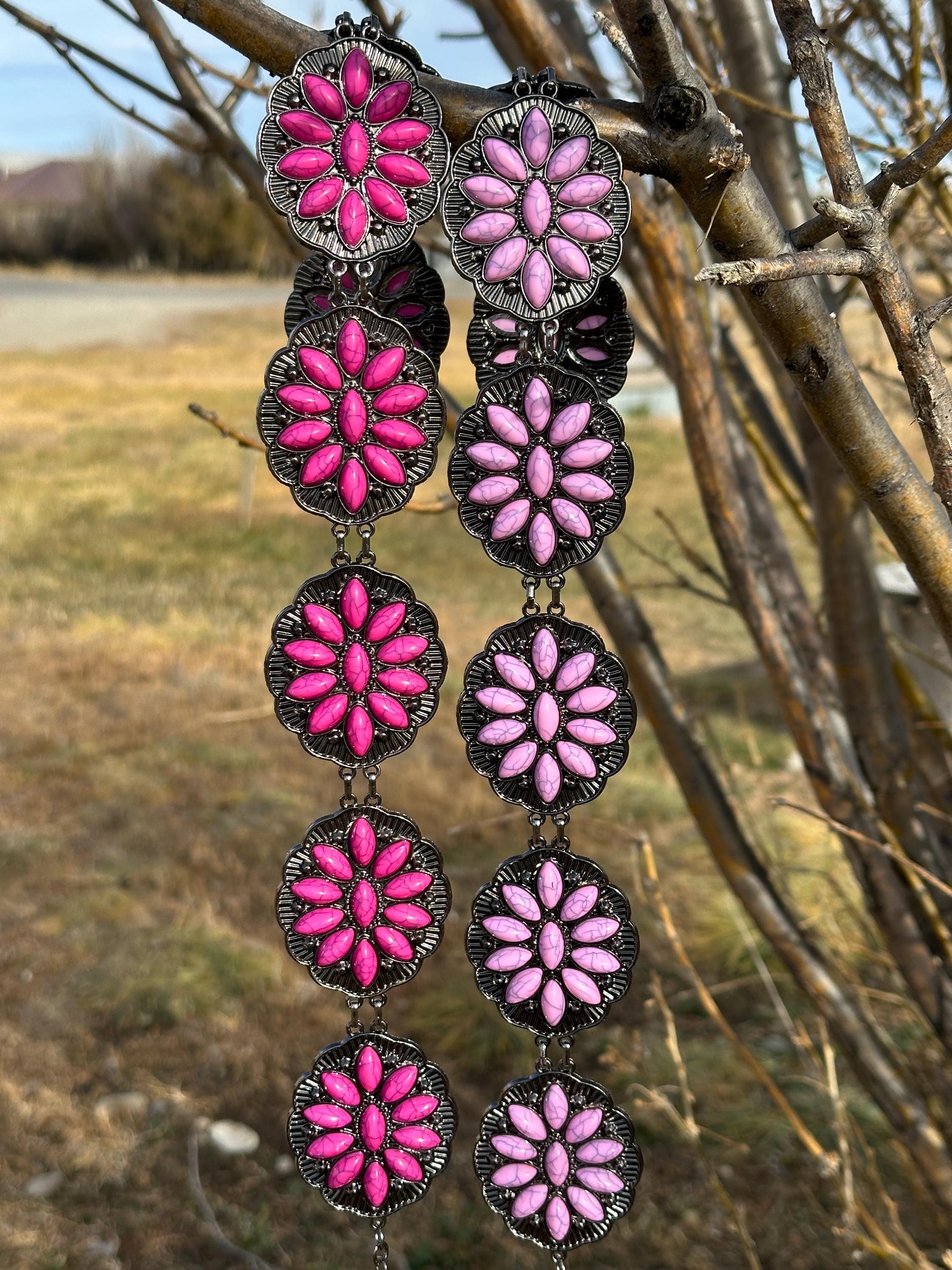 Fun & Fabulous Girls’ Concho Belts! Add a pop of vibrant Western style to any outfit with these adorable concho belts, available in pink, or purple. Adjustable Fit: Fully adjustable to grow with her for lasting comfort.