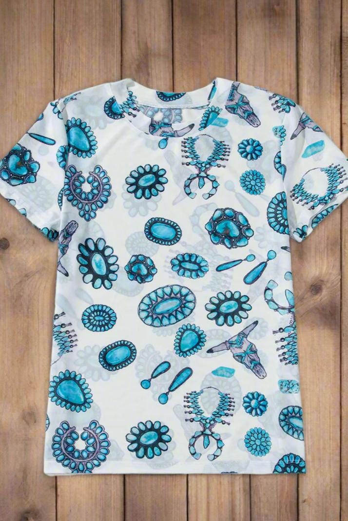 Add a touch of Western flair with this stylish Western Mesh Shirt! Talk about Cowgirl Aesthetic! Featuring cow skulls, squash blossoms, and turquoise conchos, this sheer print tee is soft, comfy, and perfect for layering....or not! Shop Razelsâships FREE with $35+ purchase from MONTANA TODAY!