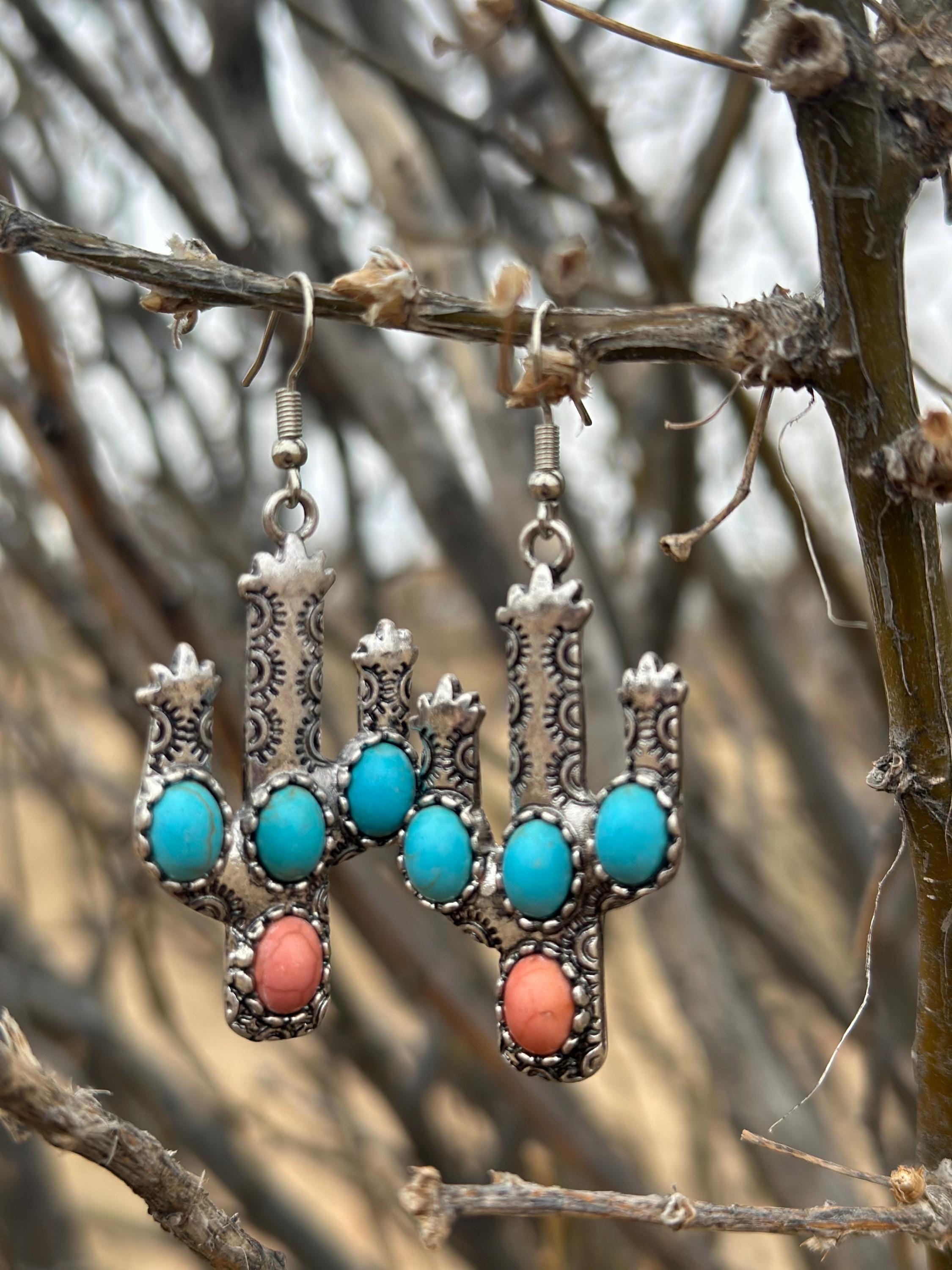 Western Cactus Earrings, featuring turquoise and coral stone accents. Lightweight and comfy these Cactus Earrings are perfect for daily wear or special occasions. Shop Razels—FREE shipping on $35+ orders! 🌵✨