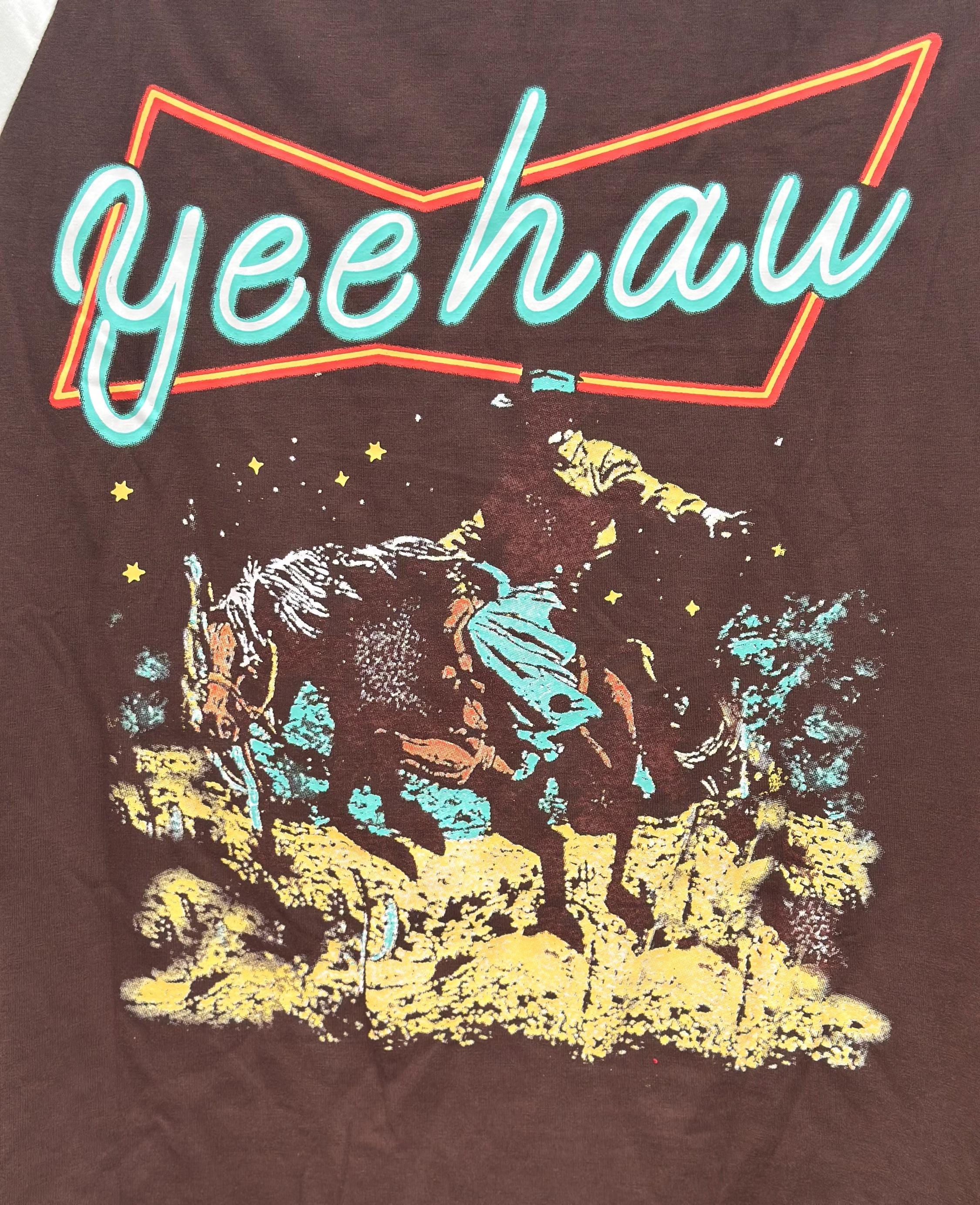 YEEHAW Shirt: This Women's Western Shirt blends style and comfort with bold "Yeehaw" graphics. Perfect as a Cowgirl Shirt or casual Raglan Sleeve Top, it's a versatile Women's Casual T-shirt for rodeos, outings, or everyday Western vibes! SHIPS FREE