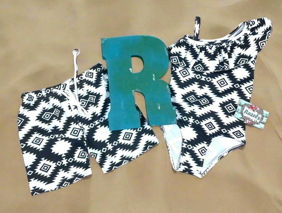 Matching Western Swimsuits for Kids 🖤🤍  Western Black and White Swimsuits, Boys Swim Trunks, Girls One Piece Swim
How fabulous are these matching swimsuits for your little cowboys and cowgirls?! Western sibling swimsuits have never been cuter! Featuring a stunning black and white Aztec/geometric pattern, these swimsuits come in your choice of:
✔️ Boys Trunks (can double as day shorts!)
✔️ Girls' One-Piece Swimsuit
SHIPS FREE FROM MONTANA WITH $35+ PURCHASE