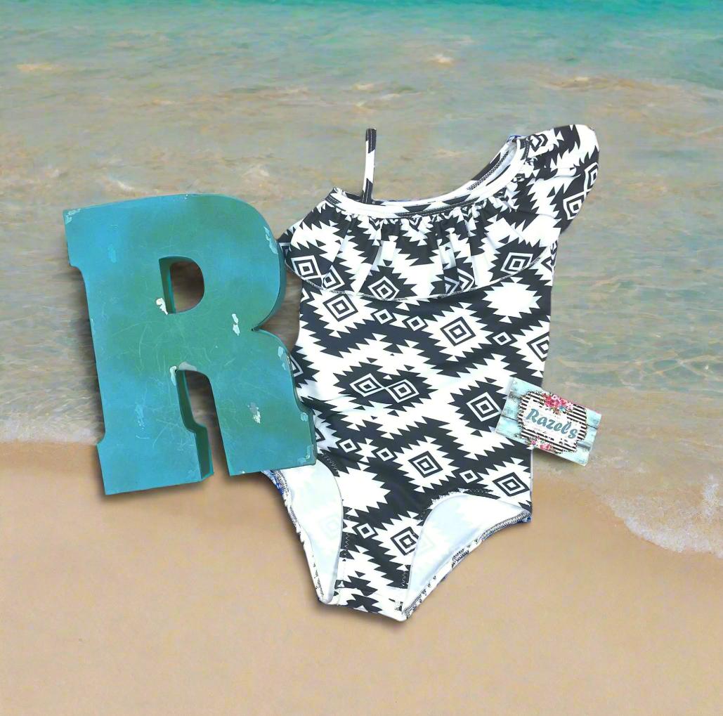 Matching Western Swimsuits for Kids 🖤🤍 Western Black and White Swimsuits, Boys Swim Trunks, Girls One Piece Swim
How fabulous are these matching swimsuits for your little cowboys and cowgirls?! Western sibling swimsuits have never been cuter! Featuring a stunning black and white Aztec/geometric pattern, these swimsuits come in your choice of:
✔️ Boys Trunks (can double as day shorts!)
✔️ Girls' One-Piece Swimsuit
SHIPS FREE FROM MONTANA WITH $35+ PURCHASE