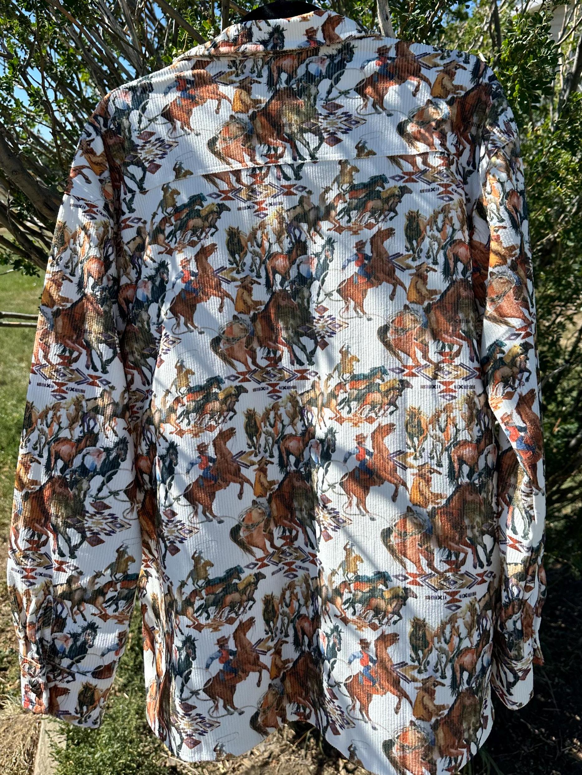 Women's Western Corduroy Cowboy Shirt – Vintage Cowgirl Button-Up. Meet your new favorite go-to piece—the Cowgirl Button-Up Corduroy Shirt! This vintage cowboy print shirt blends classic Western charm with effortless style, making it a must-have for any cowgirl’s wardrobe.
Shirt features an Authentic Cowboy Print – A unique blend of soft brown, cream, and green tones for a true Western vibe.
Corduroy Fabric and is Versatile & Stylish. Ships FREE from MONTANA today!