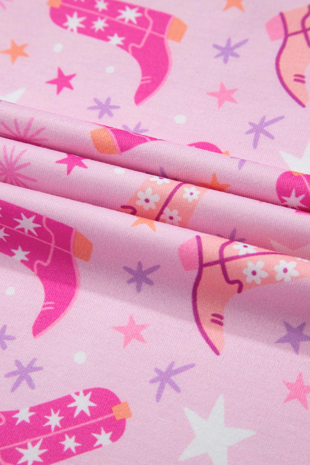 Pink Cowgirl Summer Pajamas | Western Lounge Set | Cowgirl Boot Pajamas 🌵 Cowgirl dreams meet summer comfort! This two-piece pajama set features an allover Western boots print in gorgeous shades of pink, orange, and white, accented by twinkling stars for the ultimate cowgirl vibe. Stylish, breathable, and oh-so-cozy! ✔ Two-Piece Set – Includes t-shirt-style top and matching shorts with pockets and a drawstring waist for the perfect fit. SHIPS FREE from MONTANA TODAY