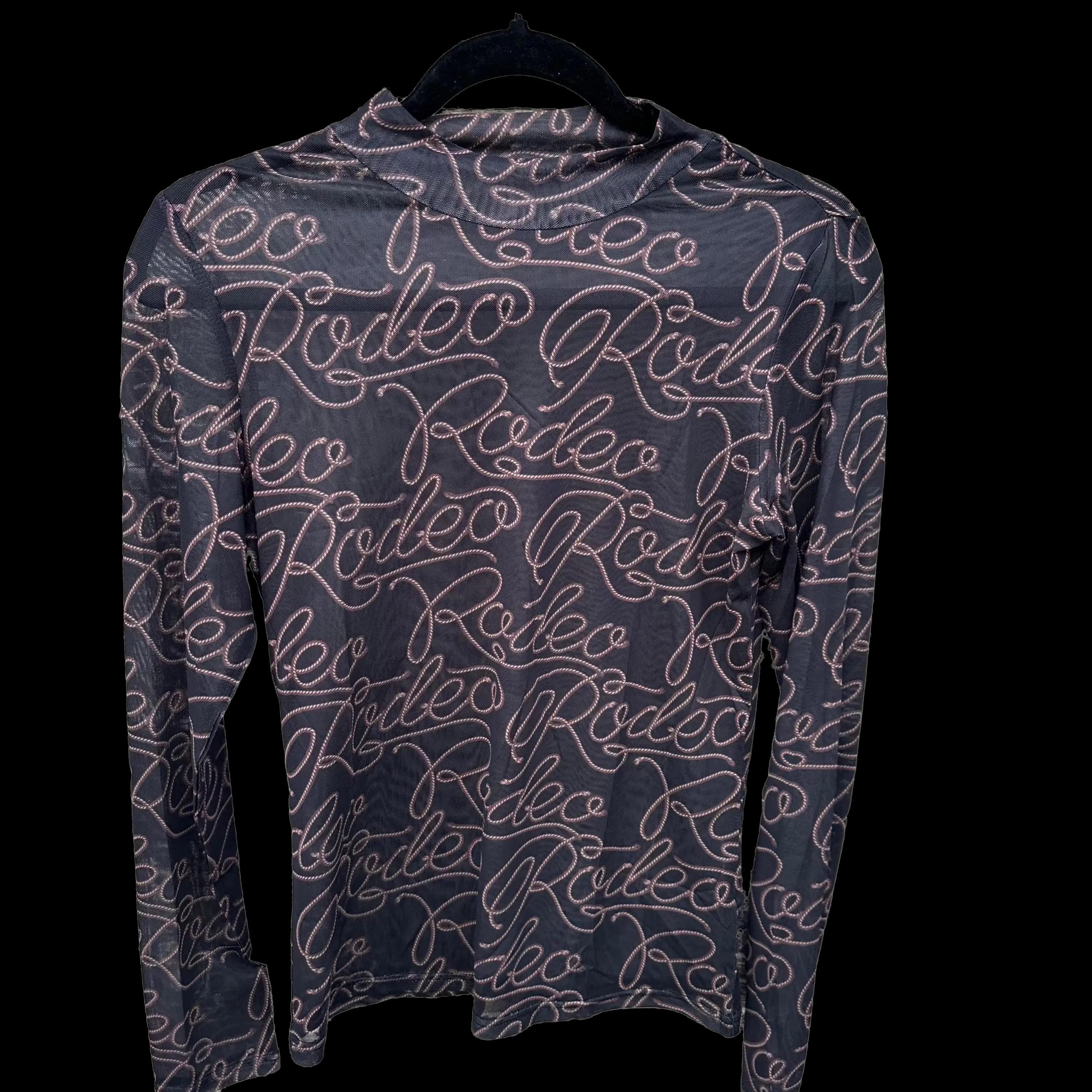 Rodeo Shirt, Western SHEER Shirt, Rodeo Nights T-Shirt, Cowgirl Shirt, Layering Shirt
Turn heads on rodeo nights with this bold Western SHEER Shirt! This cowgirl shirt features a striking RODEO print on soft, breathable mesh—perfect for layering over your favorite Rodeo Nights T-shirt or wearing on its own. Whether you're at the arena or out on the town, this layering shirt adds the perfect Western edge to your outfit.