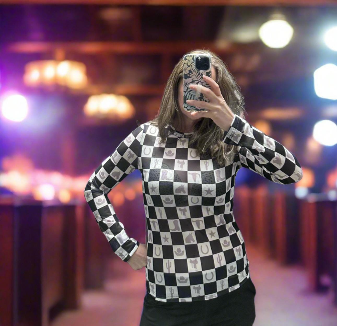 Western MOTIF SHIRT | SHEER Checkerboard TOP | LAYERING TOP | BODYCON | COWGIRL SHIRT
Unleash your inner cowgirl with a bold, modern twist! This Western Motif Shirt is the perfect blend of classic Western charm and edgy contemporary style. Designed for effortless layering, this sheer checkerboard top features an eye-catching mix of cowboy hats, horses, cacti, saddles, boots, steer heads, and more—making it the ultimate cowgirl shirt with attitude.
