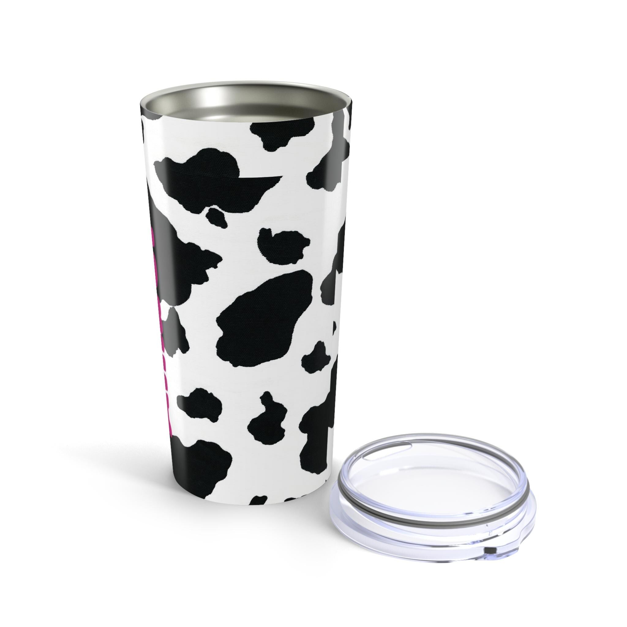 Moo-ve over boring drinkware—this tumbler is all about style + personality! 🌸 Our personalized cow print tumbler features your custom name wrapped in the cutest black-and-white pattern for a sassy, farmhouse-chic vibe. 
✓ Add your name for a custom touch that’s udderly adorable 🌿
✓ Double-walled stainless steel keeps drinks hot or cold for hours
✓ Glossy finish shows off the bold cow print in all its glory ✨
✓ Vacuum-insulated with clear push-on lid—perfect for life on the go ☕