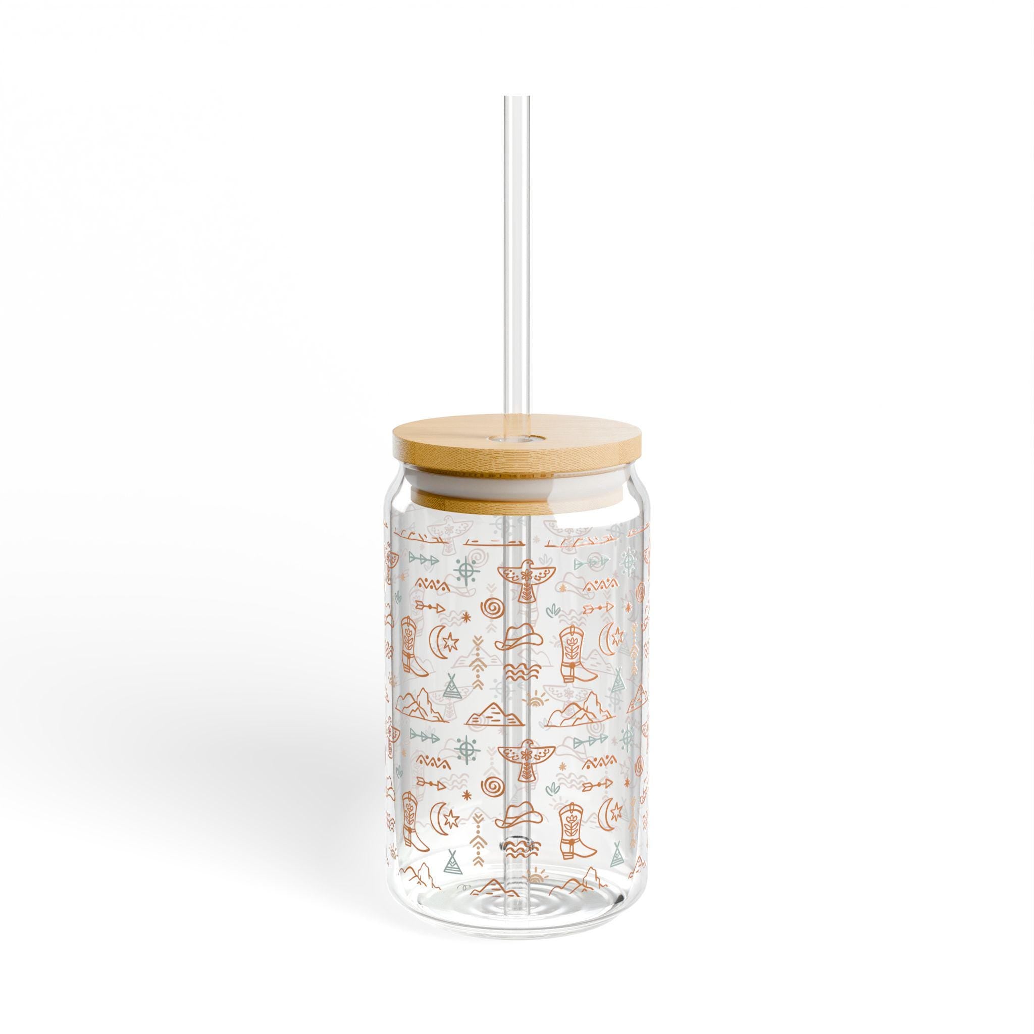 ✓ Iconic western design with thunderbirds, arrows, boots & mountain motifs ✓ Clear 16oz tempered glass—sturdy, stylish, and perfect in hand ✓ Includes eco-friendly bamboo lid + durable Tritan straw ✓ Ideal for iced coffee, smoothies, tea, or lemon water on the go ✓ Perfect for Earth Day gifts, summer birthdays, and housewarming vibe