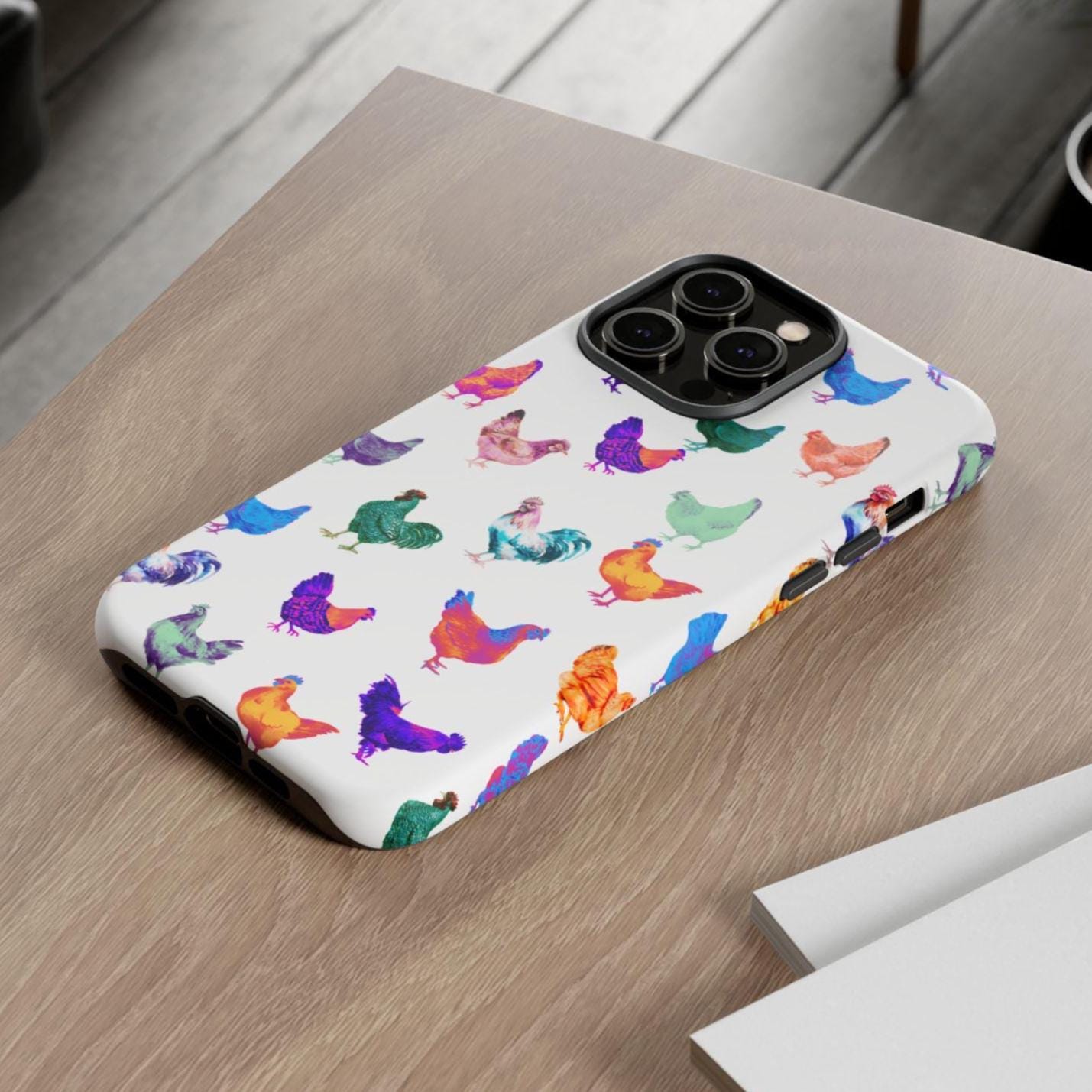 CUTE CHICKEN PHONE CASE | Neon Chicken Design | Quirky Gift for Chicken Lovers
✔️ Bright 3D Wrap – Every chicken pops with color and personality!
✔️ UV Protection – Keeps your case looking bold and vibrant.
✔️ Durable & Impact-Resistant – Built to handle drops, bumps, and everyday adventures.
✔️ Shock-Absorbing Silicone Liner – Extra protection, zero bulk.
✔️ Wireless Charging Friendly – Because convenience matters.
✔️ Wide Compatibility –