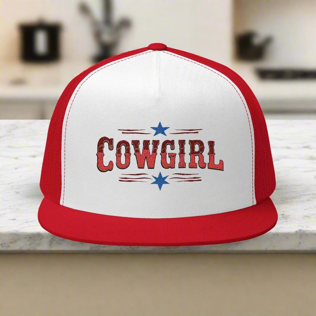 Add a bold pop of Western charm to your summer with this trendy cowgirl trucker cap! Whether you're headed to a rodeo, BBQ, beach day, or just kicking back with friends, this 5-panel hat brings retro style and comfort in one cool package.
✅ Structured five-panel design with flat bill
✅ Breathable mesh back for warm weather comfort
✅ Adjustable snapback closure for a custom fit
✅ Made from a soft cotton/nylon/poly blend
✅ Embroidered "Cowgirl" design in red, white, and blue for