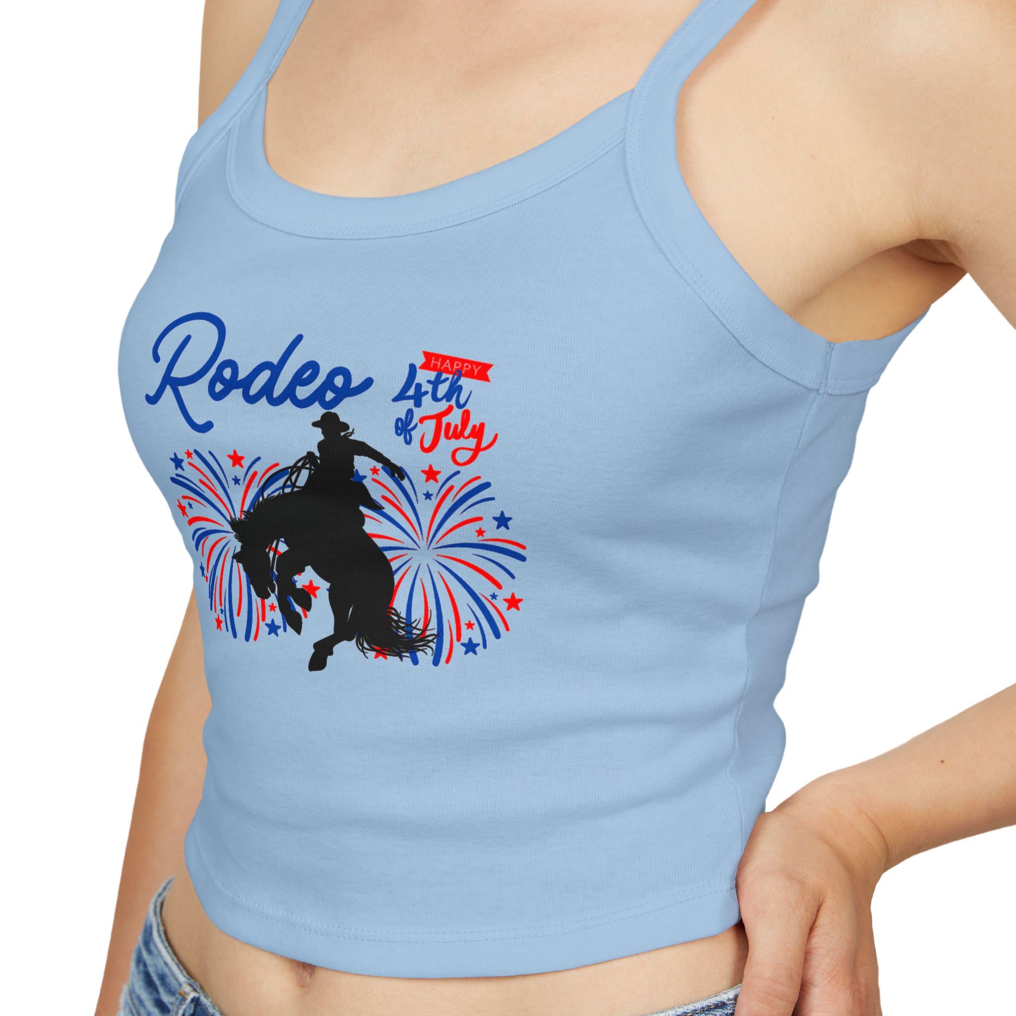 Rodeo Crop Tank – Bronc Rider & Fireworks for the 4th of July
Celebrate Independence Day with a little rodeo flair! This cropped spaghetti strap tank features our bold bronc rider silhouette bursting through red, white, and blue fireworks—perfect for cowgirls who love freedom, fashion, and a little yeehaw energy 🤠🎆
Made from a buttery-soft cotton blend with supportive thick straps, it’s made for sunny parades, backyard BBQs, or dancing under fireworks.