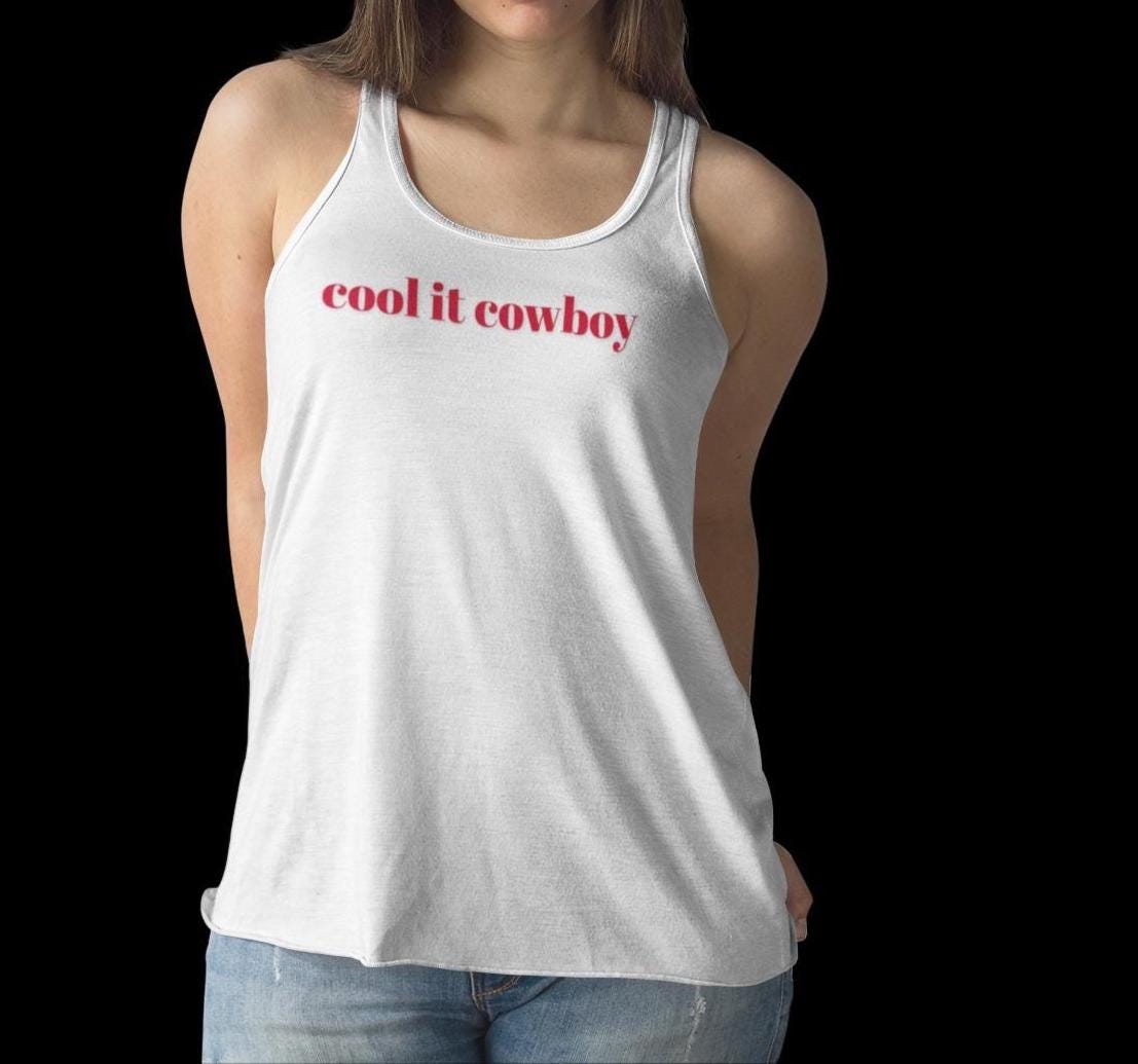 đ€ Cool It Cowboy â Western Racerback Tank for Women
Our spicy fan-favorite saying âCool It Cowboyâ is now heat-pressed on your new go-to racerback tank!
Available in 7 gorgeous colors, itâs soft, breathable, and ready to ride with you from gym sesh to grocery run.
â Lightweight & breathable (4 oz cotton/poly blend)
â Soft feel with comfy self-fabric binding
â Flattering scoop neckline + racerback cut
â Tear-away label for no-itch wear
â Great for workouts, errands, or casual Western vibes