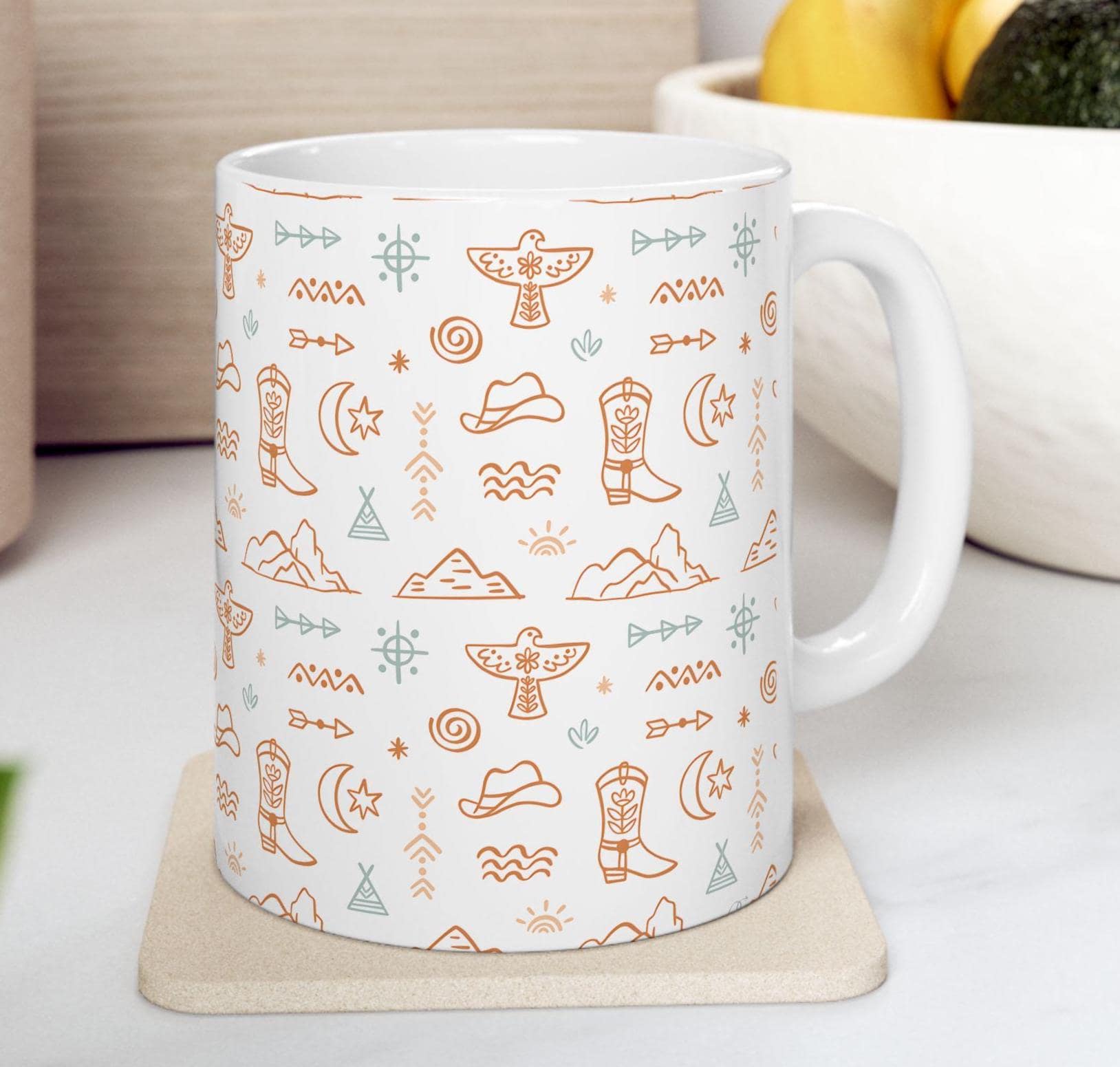 Western Motif Cowgirl Ceramic Mug 🤠 (11oz or 15oz) – Beige & Turquoise Boots, Stars & Thunderbirds
Start your day with big Western energy 🌄☕ This vibrant ceramic mug features an allover print of boots, cowgirl hats, stars, mountains, and thunderbirds in warm beige and turquoise tones—a cozy combo that captures the spirit of the open range.
Whether you're sipping coffee at sunrise or winding down with tea by the fire, this mug brings rustic charm and a stylish flair to your daily rituals