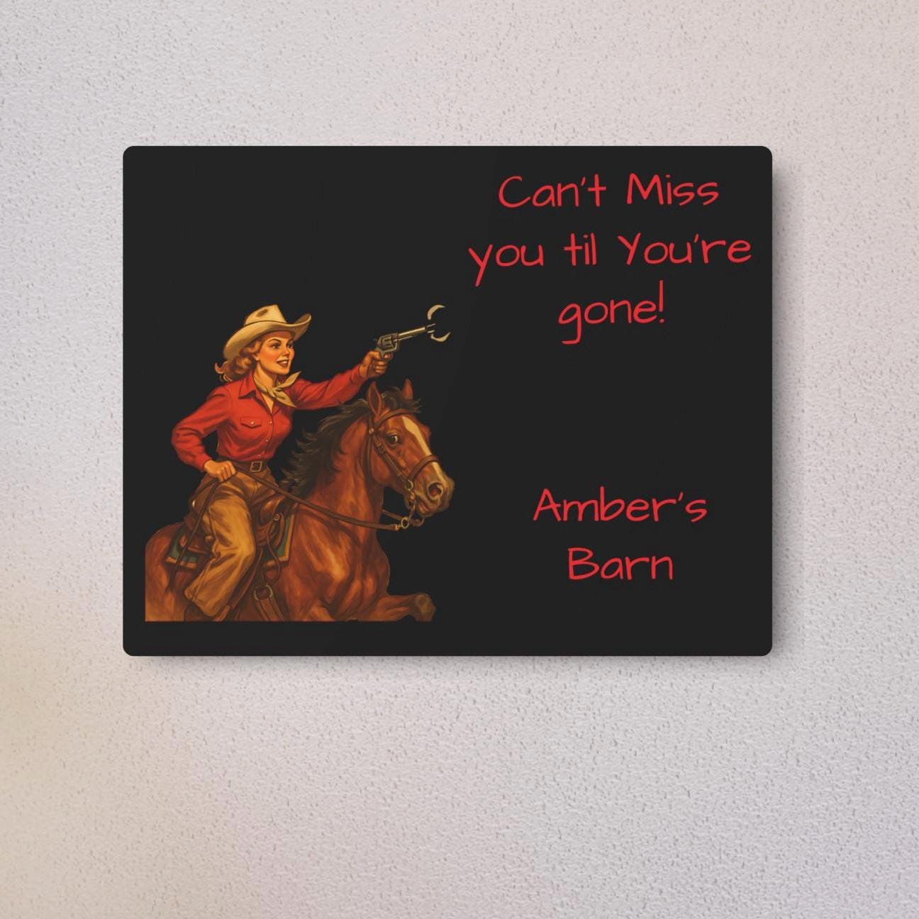 Retro Cowgirl Metal Sign ā Personalized Western Decor black metal cowgirl sign! Featuring a vintage-style silhouette of a pistol-packinā cowgirl riding her trusty horse and the cheeky phrase āCanāt miss you ātil youāre goneā Whether you hang it on your front door, barn, tack room, or inside your home ā Made from durable, lightweight 100% aluminum ā Matte finish ā Comes ready to hang ā Available in multiple sizes ā Customizable text ā make it yours!