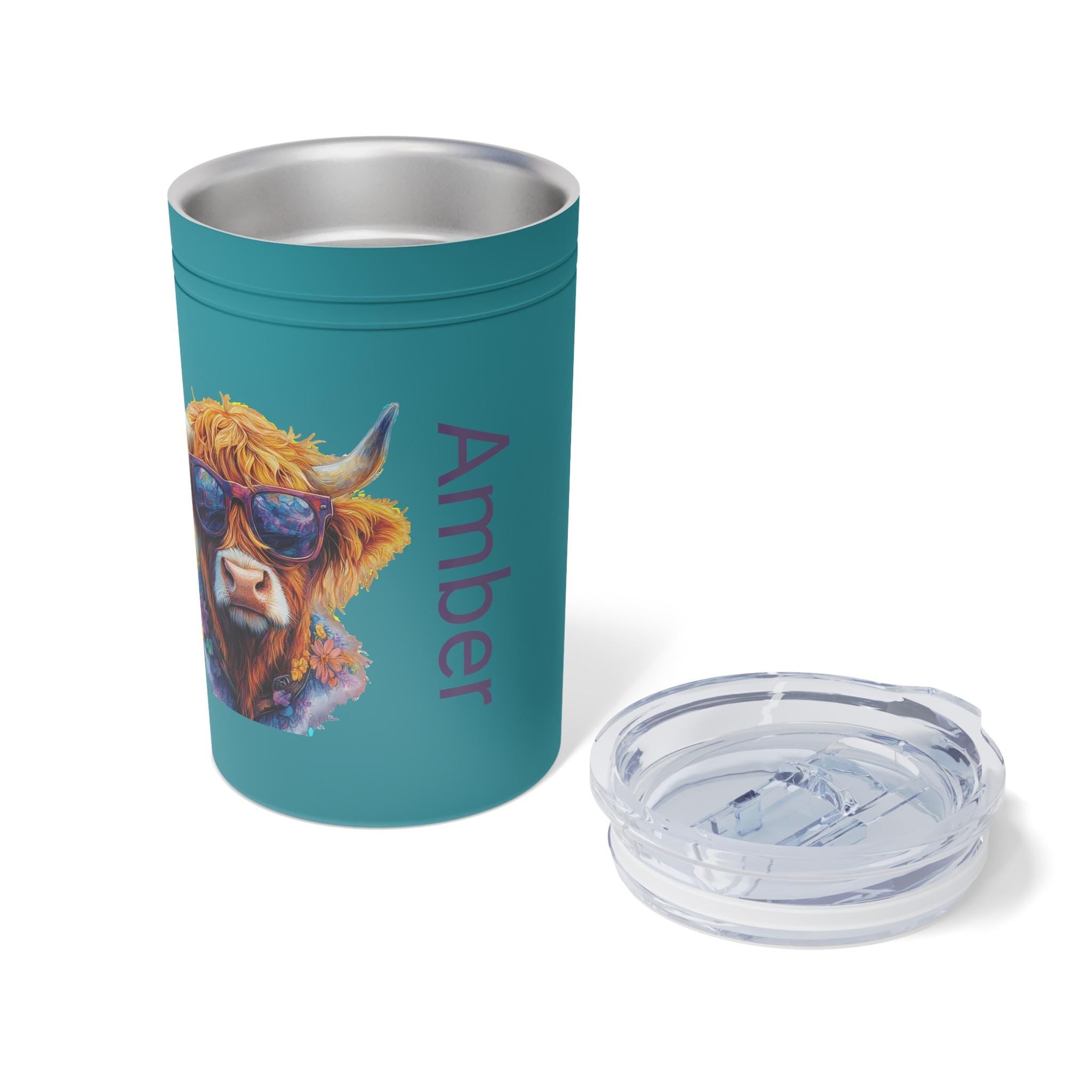 This Personalized Highland Cow Tumbler is a custom insulated mug perfect for cow lovers. The unique design adds a touch of personality to your daily coffee or tea routine. It keeps drinks hot for 5 hours and cold for 15 hours, making it ideal for on-the-go use. This tumbler is relevant for animal lovers and can be gifted for birthdays, holidays, or as a special treat for yourself.
