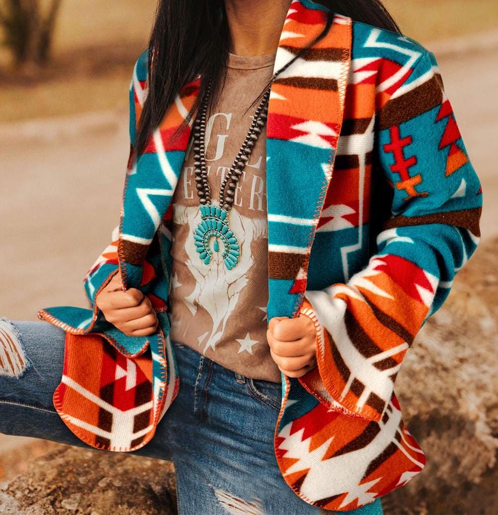 Southwestern Aztec Jacket | Tribal Cardigan | Western Blazer | Lightweight Spring Cardigan
✓ Lightweight and soft — ideal for spring and cool summer nights
✓ Bright whipstitch trim + bold tribal print = total showstopper
✓ Bell sleeves add a laid-back boho flair
✓ Pairs effortlessly with jeans and boots for an easy cowgirl outfit
✓ Open front design makes it a breeze to layer over tees or tanks