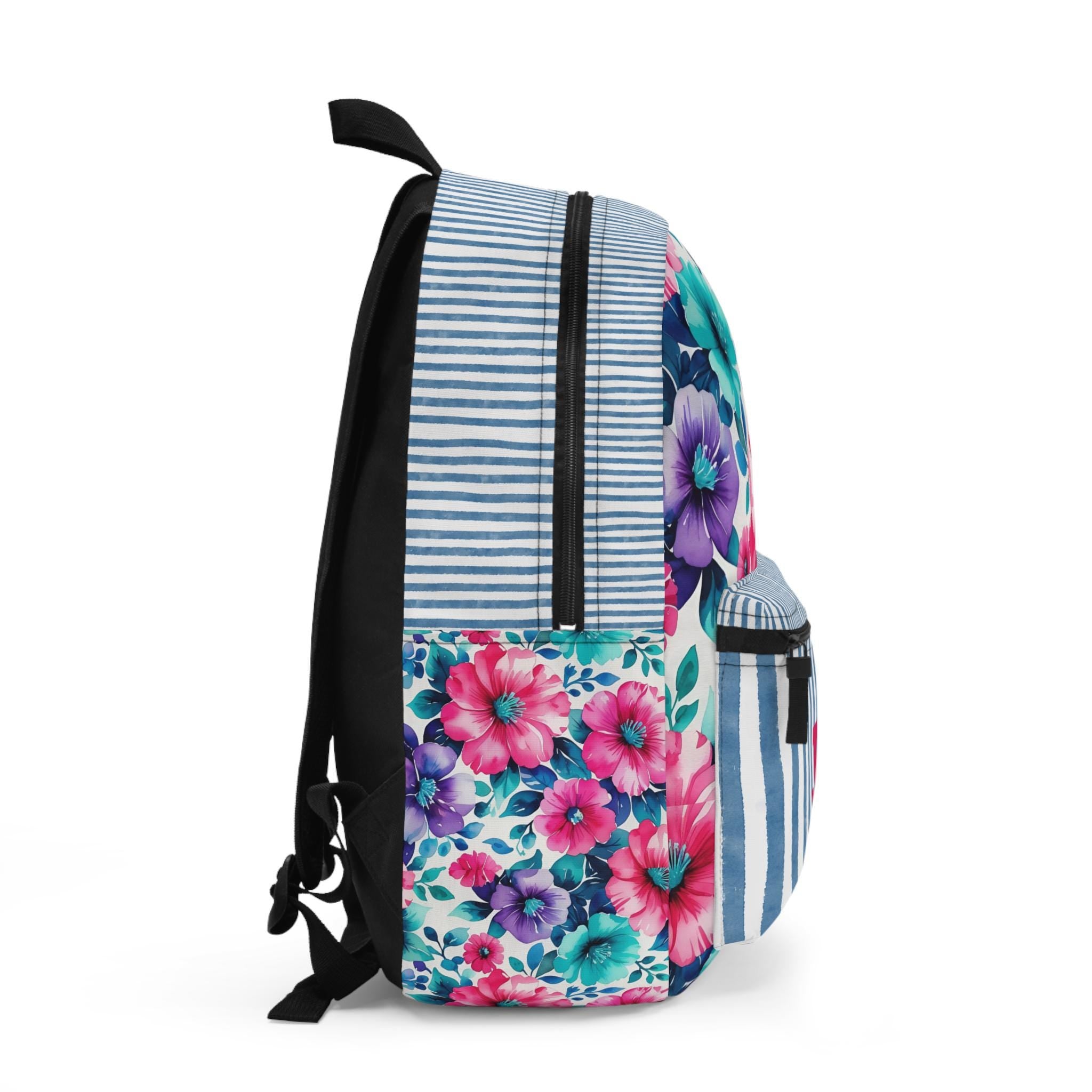Floral Monogram Backpack – Personalized Just for Her! 
Pick your stripe color, pick your font color, and add your initials or name—or keep it blank for a chic, floral statement! T
✓ Customizable with name or initials
✓ Gorgeous floral + stripe combo
✓ Spacious compartments including a padded laptop sleeve
✓ Comfy padded straps + breathable back panel
✓ Lightweight + durable = perfect for daily use