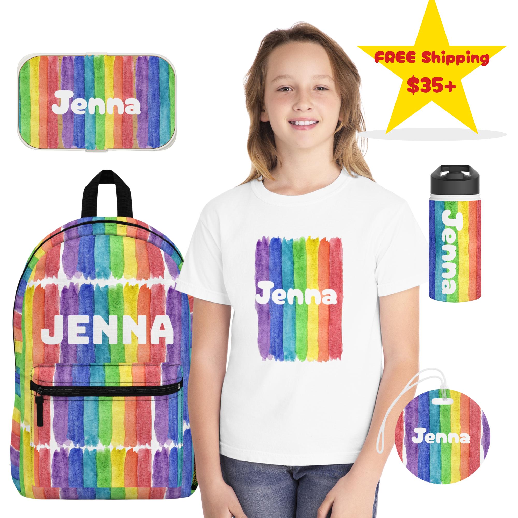 Personalized Rainbow Back-to-School Bundle – 5-Piece Custom Name Set
This all-in-one rainbow bundle includes everything your kiddo needs to head to school in colorful, coordinated style.
✓ Personalized Backpack – Durable, roomy, and colorful
✓ Custom Youth Tee – Comfy, vibrant, and name front and center
✓ Bento Lunch Box – Divided interior with leak-resistant lid
✓ Stainless Steel Water Bottle – Insulated for hot or cold drinks
✓ Bag Tag – Great for labeling backpacks, lunch bags, and more