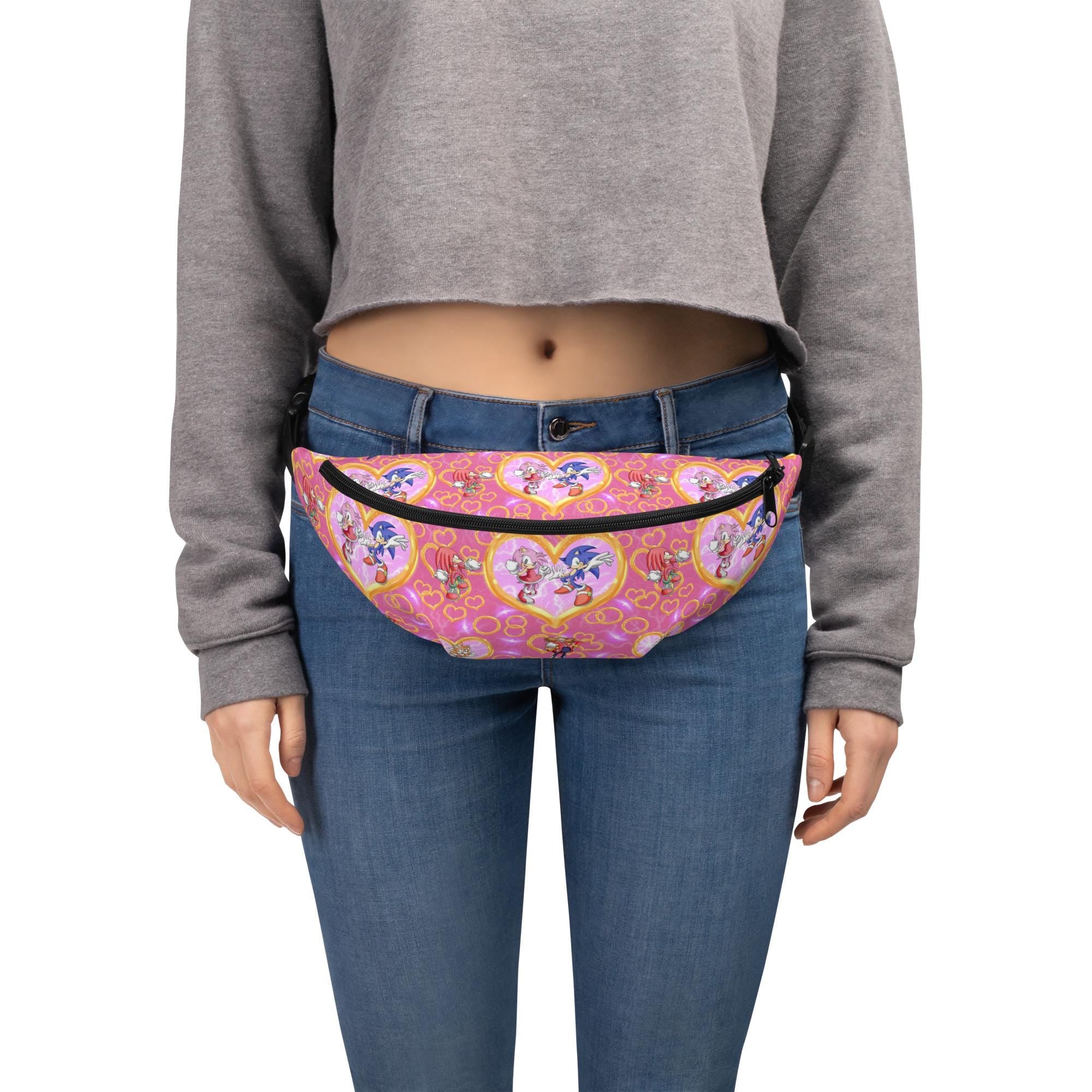 Pink Sonic the Hedgehog Fanny Pack – For Fast-Moving Fashionistas 💨💖
Zoom into cuteness with this pink Sonic fanny pack
✓ Officially awesome Sonic style in a fun pink palette
✓ Adjustable straps for the perfect fit
✓ Roomy enough for your must-haves—phone, wallet, snacks, rings?!
✓ Water-resistant to keep up with all your adventures