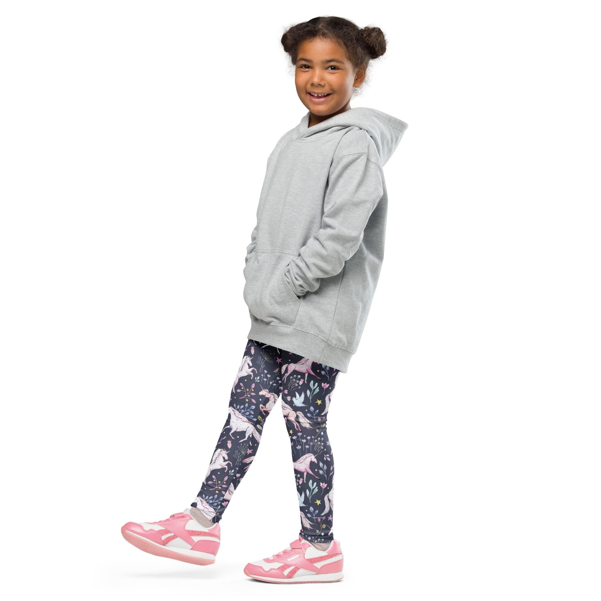 Give her back-to-school wardrobe a magical upgrade! These navy leggings are sprinkled with dreamy unicorns and delicate flowers, With their buttery-soft feel and stay-put waistband, they’re built for play and pretty.
✓ All-over unicorn + floral print she’ll love
✓ Super stretchy + comfy microfiber yarn
✓ Vibrant colors that won’t fade
✓ Elastic waistband = easy on/off
✓ Precision-cut + hand-sewn for a polished finish