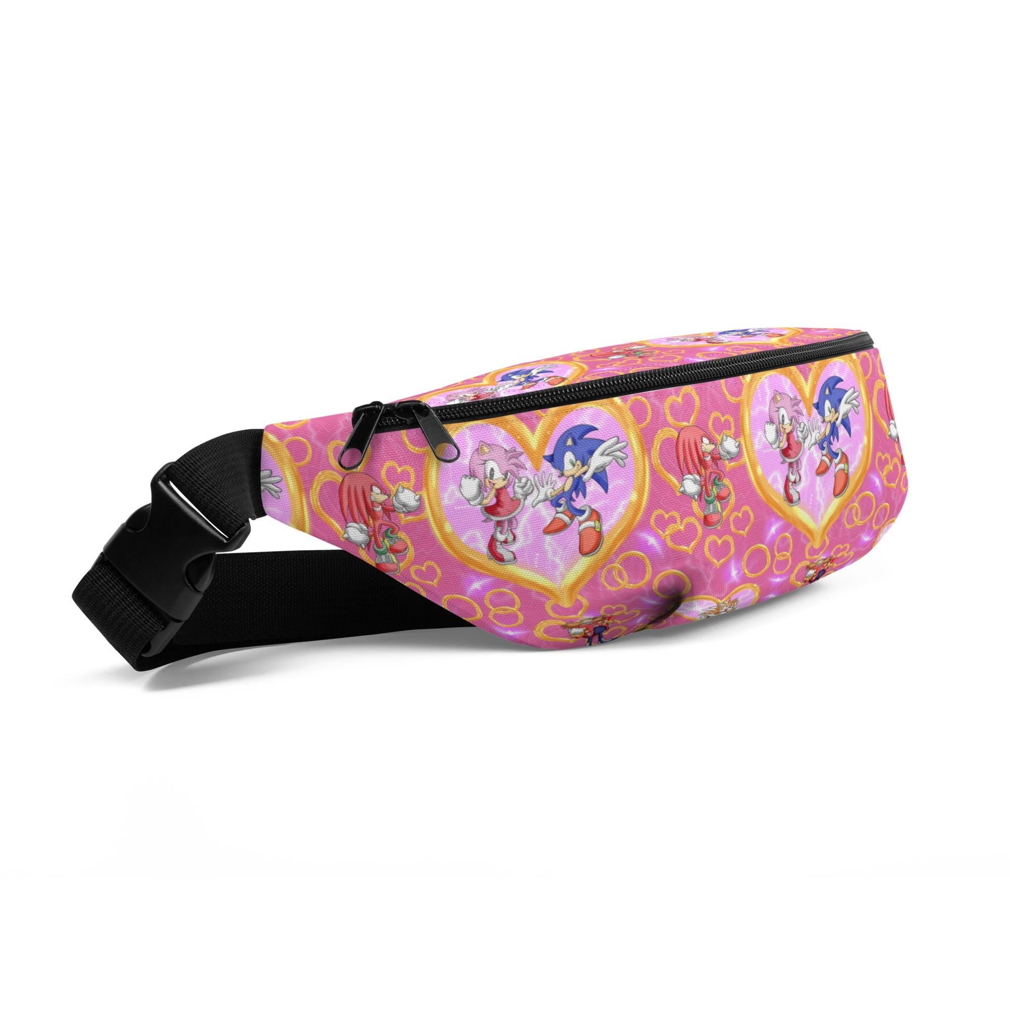 Pink Sonic the Hedgehog Fanny Pack – For Fast-Moving Fashionistas 💨💖
Zoom into cuteness with this pink Sonic fanny pack
✓ Officially awesome Sonic style in a fun pink palette
✓ Adjustable straps for the perfect fit
✓ Roomy enough for your must-haves—phone, wallet, snacks, rings?!
✓ Water-resistant to keep up with all your adventures