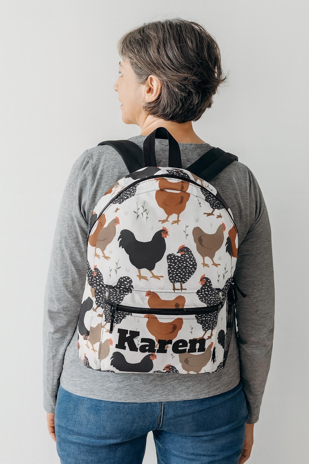 Custom Chicken Backpack – Personalized Name, Farm Hen Print, 17" School Bag w/ Laptop Sleeve
Cluck yeah! This roomy, durable backpack brings farm-fresh style to school days and errands. Add your name or initials for a custom finish kids (and chicken-loving grownups) adore.
✓ Personalization: add a name/initials (printed exactly as typed)
✓ 4 compartments: main zip (13L), front zip, side bottle pocket, interior laptop/tablet sleeve
✓ One size: 17" H × 12.5" W × 5" D (±0.5&qu