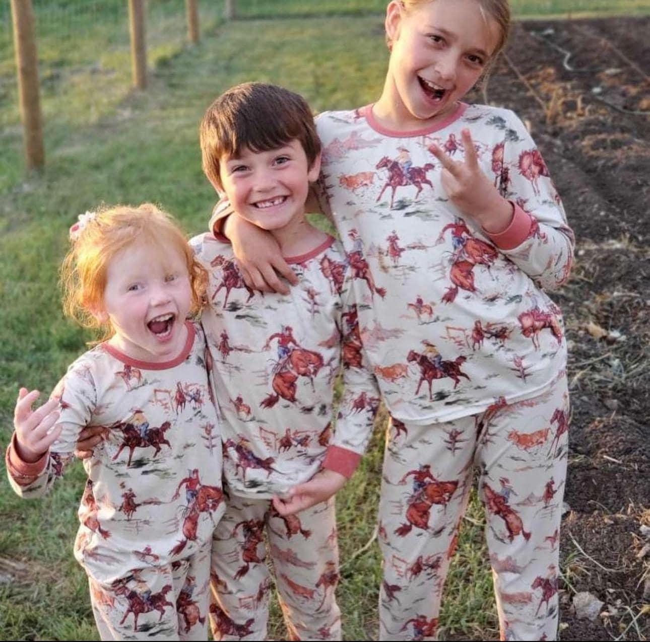 Saddle up with our exclusive Cowboy Pajamas featuring retro bucking broncs, roping steers, and steer wrestling! They’re comfy, stretchy, and true to size. Perfect for little wranglers and the whole family! Shop Razels for matching Western family PJs!
