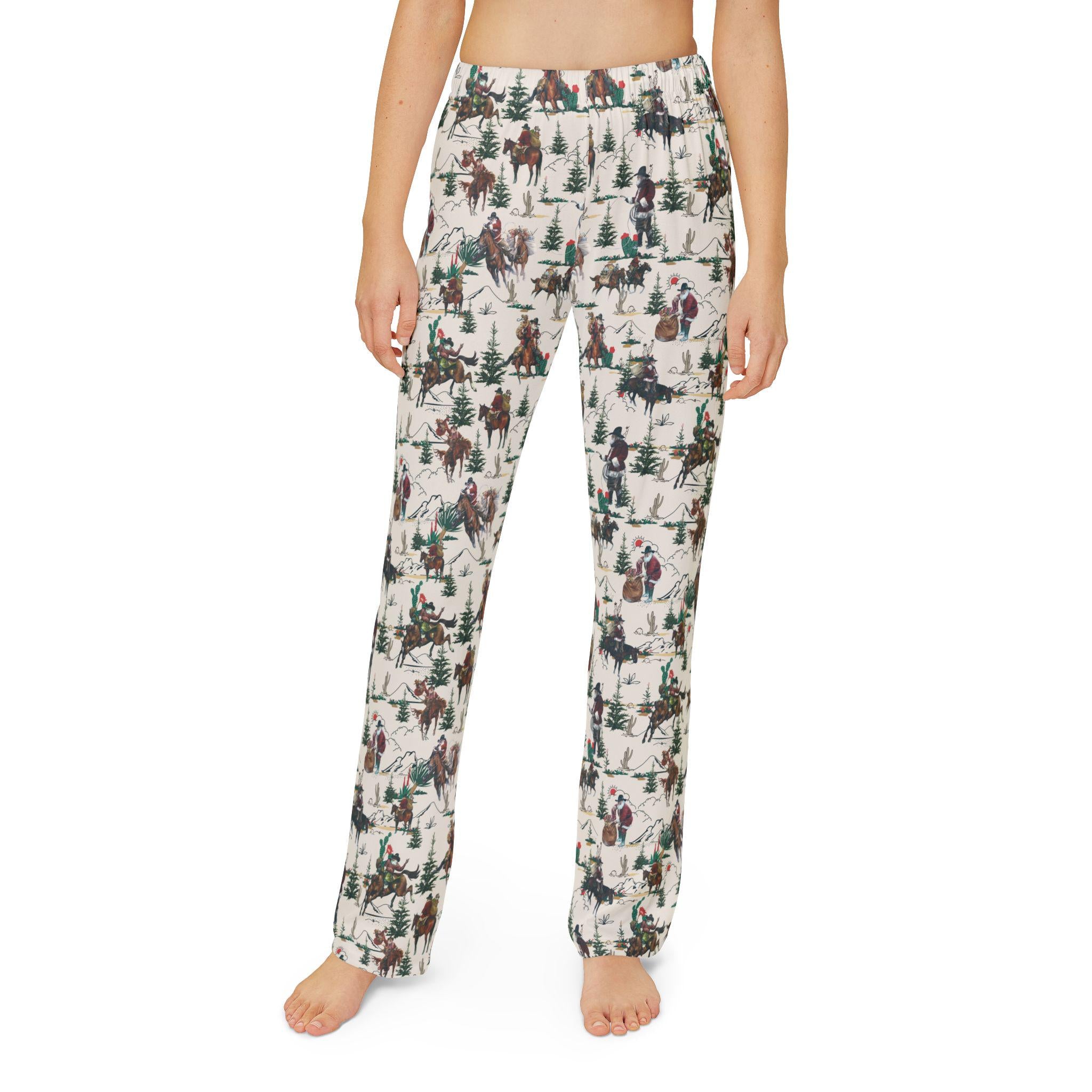 Cowboy Santa Kids Lounge Pants | Matching Family Christmas Pajamas | Soft & Comfy Kids Sleepwear
Yeehaw! 🎄 These Cowboy Santa Kids Lounge Pants are ready to giddy-up into your holiday season! Featuring our exclusive all-over Cowboy Santa print—complete with jolly ol’ Saint Nick delivering gifts on horseback (with one horse looking a little broncy!)—these pants are a festive favorite for wild little cowpokes.