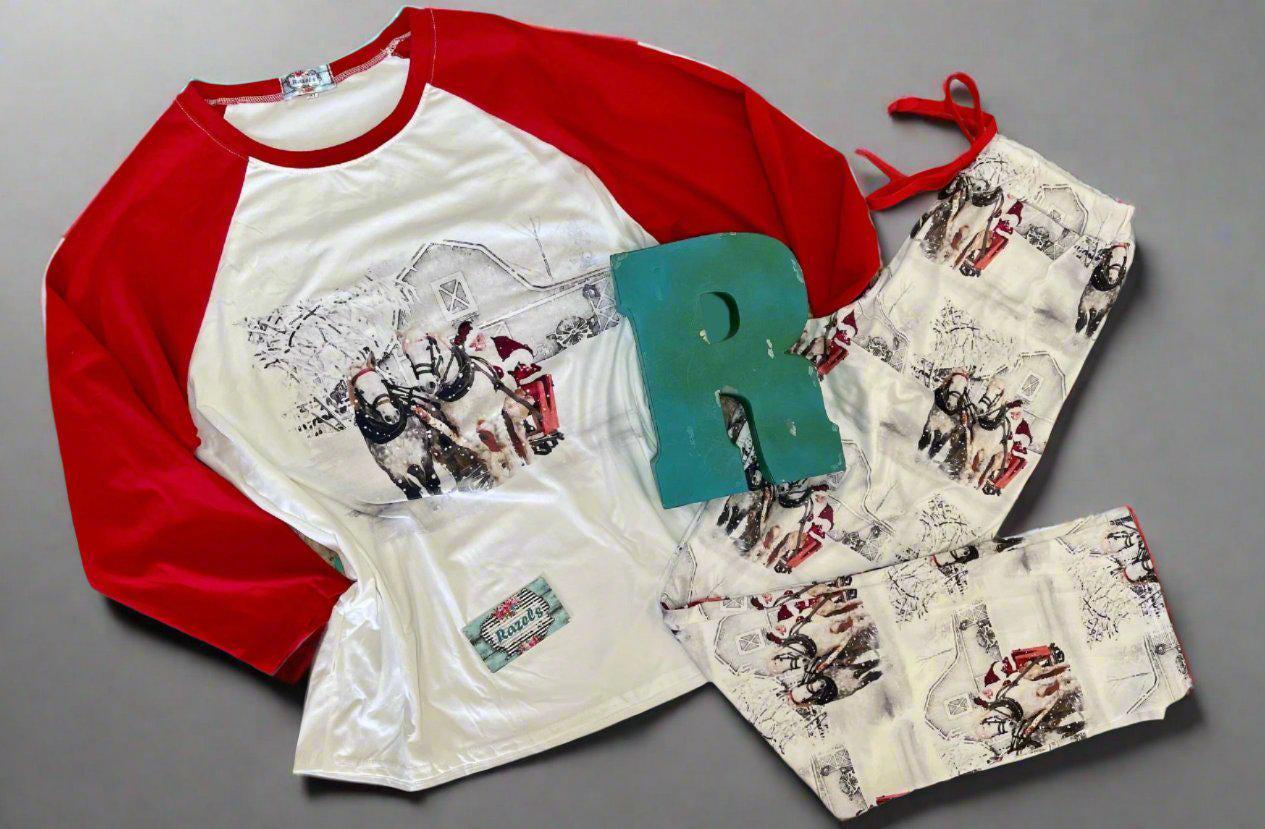 White Christmas pajamas featuring Santa at the reins of his horse-drawn sleigh! The top has red baseball-style sleeves. Comfortable fit, unisex family Christmas pajamas.