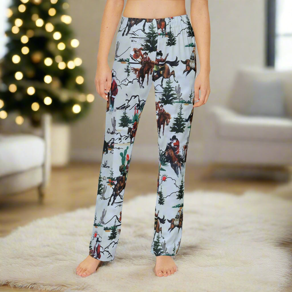 kids Cowboy Santa  Pajama Pants
Cozy up Western style with our bestselling Cowboy Santa print—now available on ultra-comfy Women’s Pajama Pants! Originally found only on our Christmas family PJs, this fun and festive design features Cowboy Santa delivering gifts on horseback (with a little bronc action, of course!).