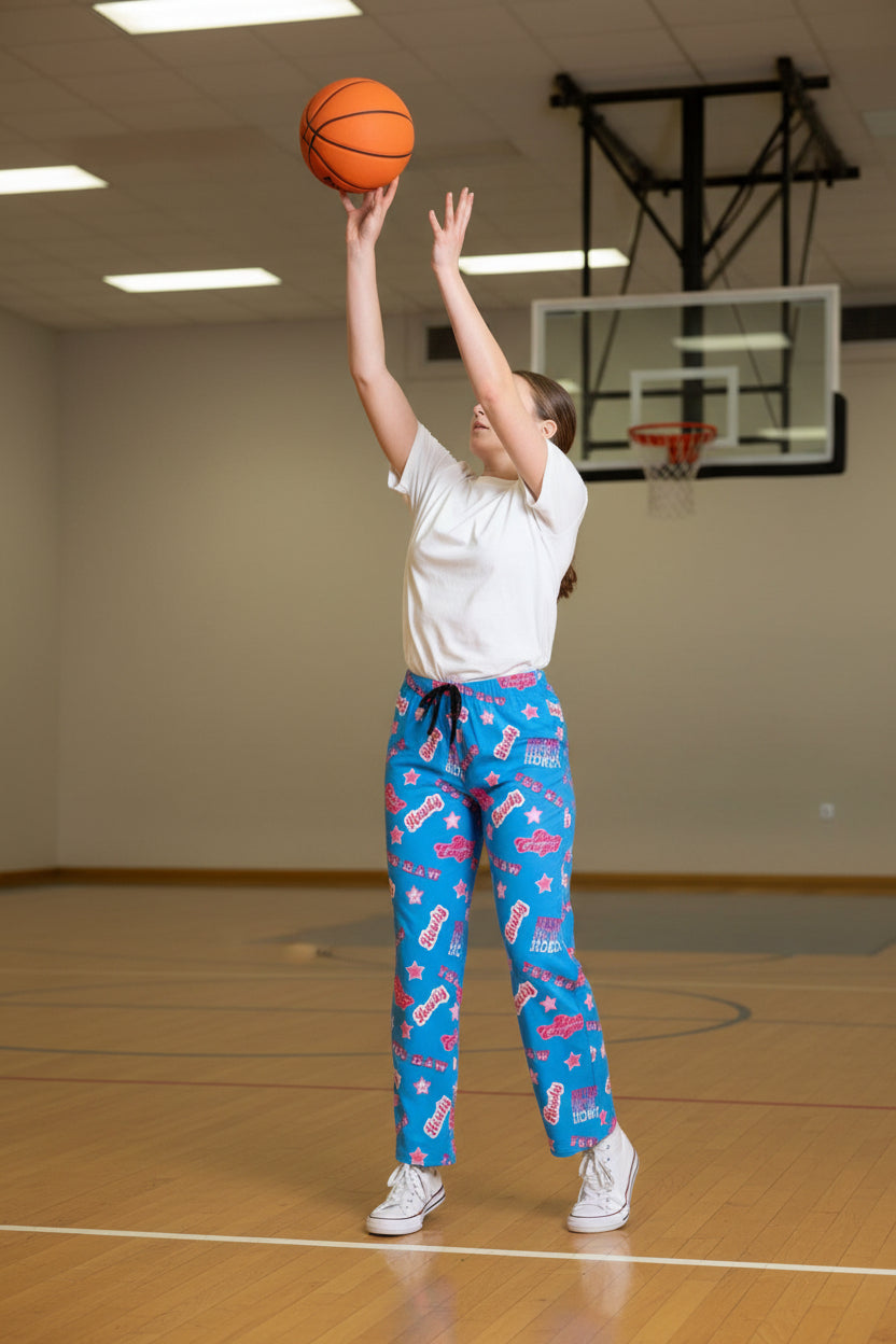 girl playing basketball wearing razels purple western loungepants