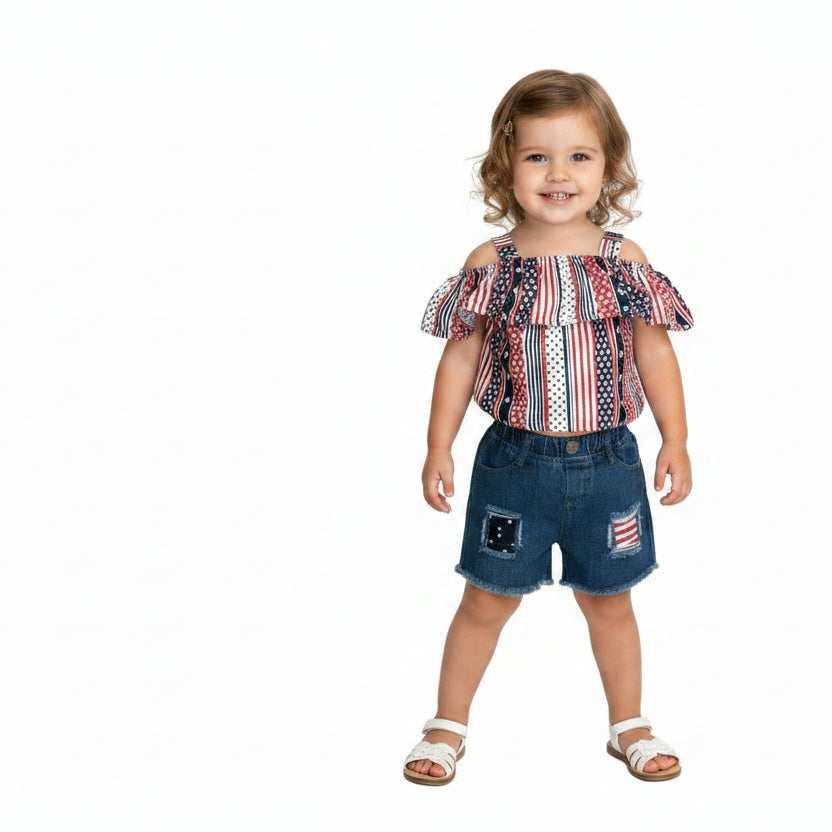 4th of July Toddler Outfit | Flag Shirt & Distressed Jean Shorts Set | USA Kids Clothes | Sizes 2T–5T ⭐ 50% OFF! ⭐ Oh my stars… and stripes!
This 4th of July short outfit is the ultimate summer must-have for your little firecracker! Classic light-wash denim with festive red, white, and blue peeking through the distressed details.
A bold American flag print meets sweet style with cold-shoulder cutouts and a flouncy ruffle.