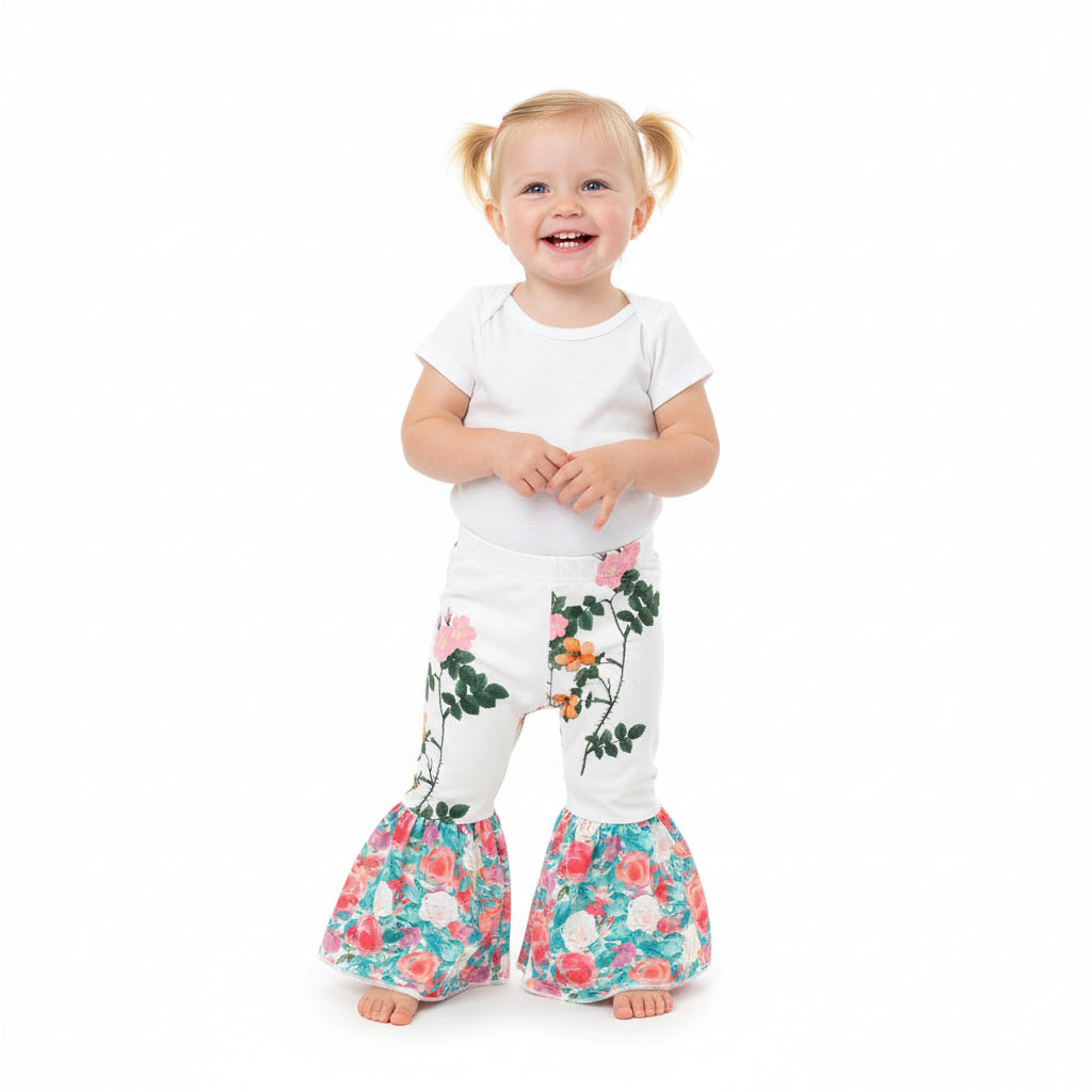 Floral Bell Bottoms designed with vibrant flower patterns and fun, playful colors are made with high-quality materials that promise comfort and durability, ensuring they’ll be a favorite all season long. These Wildflower pants will not disappoint!