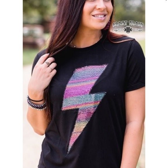 Only $10 for this sparkly showstopper? Go ahead, make a statement!
✓ Black tee with an eye-catching sequin lightning bolt
✓ Soft, stretchy, and slightly roomy—size down for a fitted look
✓ Just ONE left in size Large!
She’s bold, she’s fierce, and she’s almost gone. ⚡