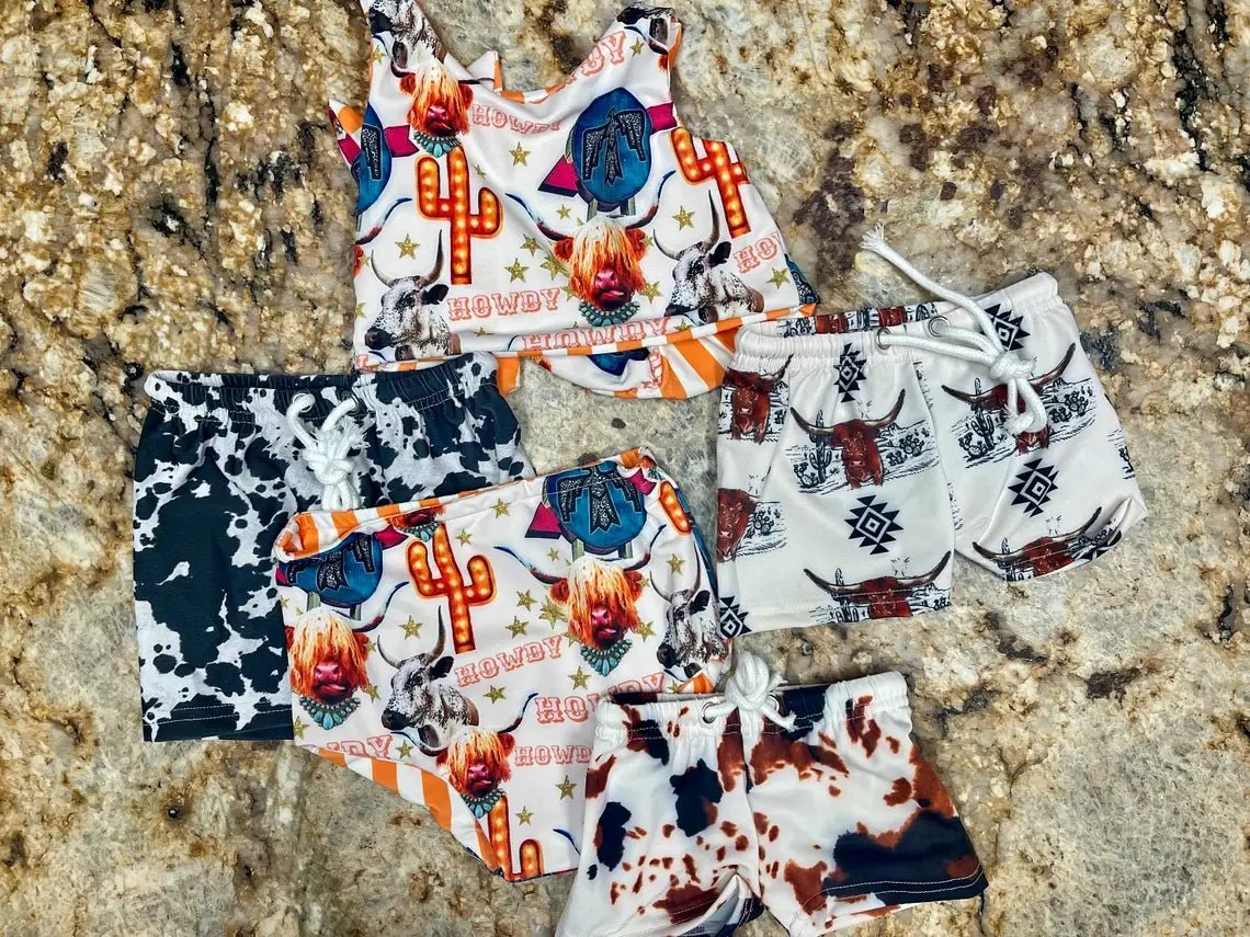 Razels Western swimsuits for kids featuring cowprints and western prints. Matching siblings too! - Razels