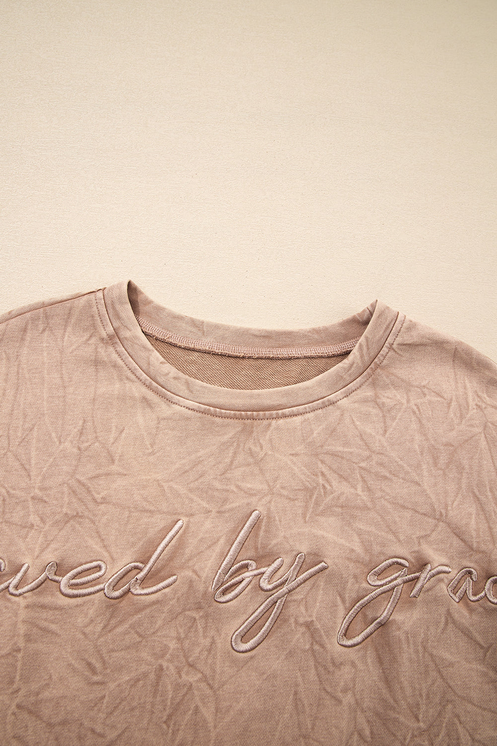 Saved by Grace Top – Embroidered Long Sleeve Mineral Wash Sweatshirt,& Christian Graphic Shirt