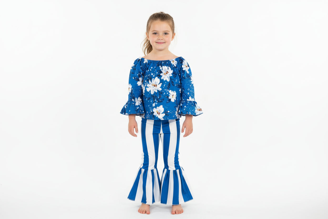 Daisy Blouse & Blue & White Striped Bell Bottom Pants Outfit is a perfect pick for SPRING ✔ Eye-catching Design: Blouse features a white daisy print on a blue blouse. The coordinating blue-and-white striped bell-bottom pants add flair to the outfit.