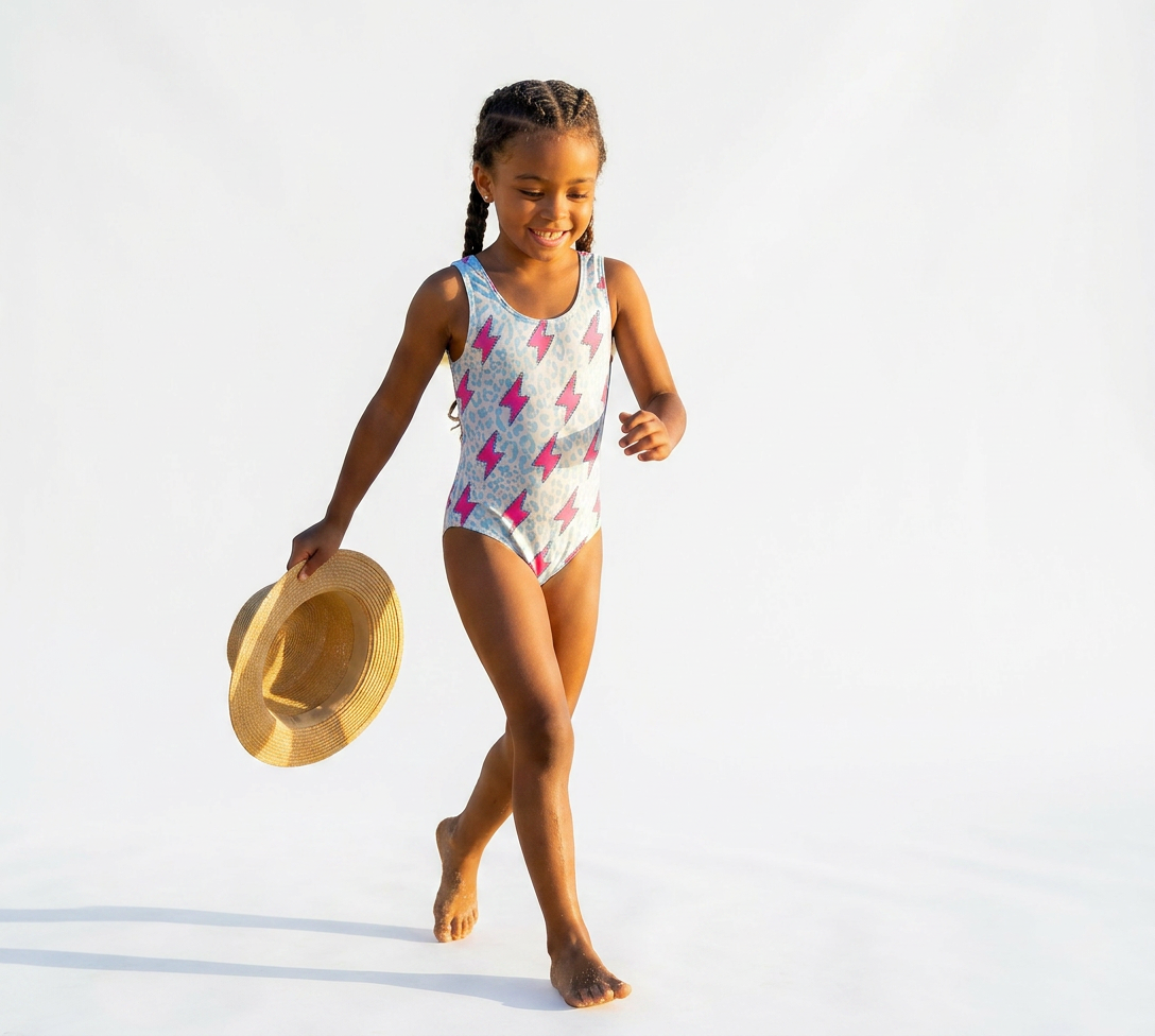 Girls Pink Lightning Bolt Swimsuit: Turquoise Cheetah Print Tie-Back