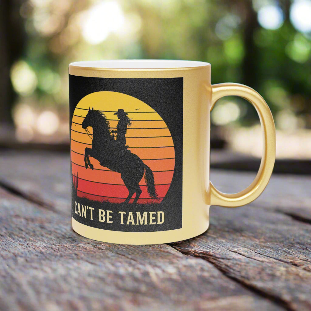 Metallic Gold Cowgirl Mug – “Can’t Be Tamed”
✨ Yeehaw with a little extra shine ✨

Start your day with a whole lotta sass and a touch of shine. Our Can't Be Tamed cowgirl mug is dipped in metallic gold glam and packed with rodeo-ready attitude. Whether you're chuggin’ coffee before a trail ride or winding down with tea under the stars, this mug’s got your wild cowgirl spirit written all over it.

✓ 11oz ceramic mug – just the right size for your favorite brew
✓ Flashy metallic gold coating that catches the 