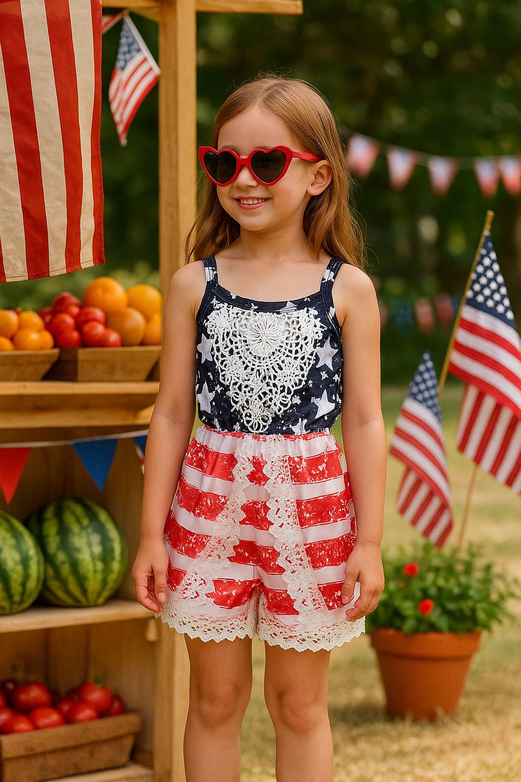 girl wearing 4th of July Girls Romper USA Flag Outfit Patriotic American Flag Jumpsuit outside at a market