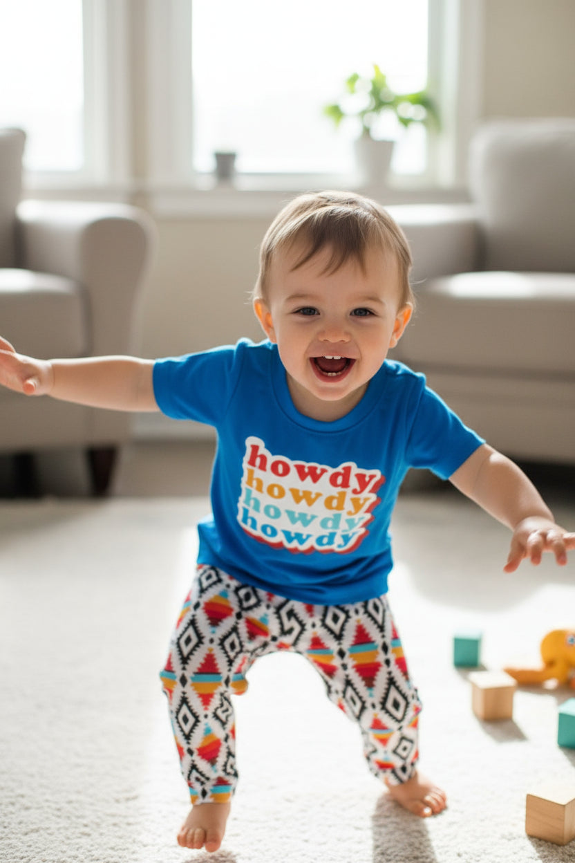 Retro Howdy Kids Western Outfit! 🤠✨ Featuring stylish Aztec jogger pants and a retro-inspired &quot;Howdy&quot; tee, this fun and comfy set is perfect for playtime, casual outings, or celebrating Western-themed events. 💥👕 Ships FREE with $35+ order