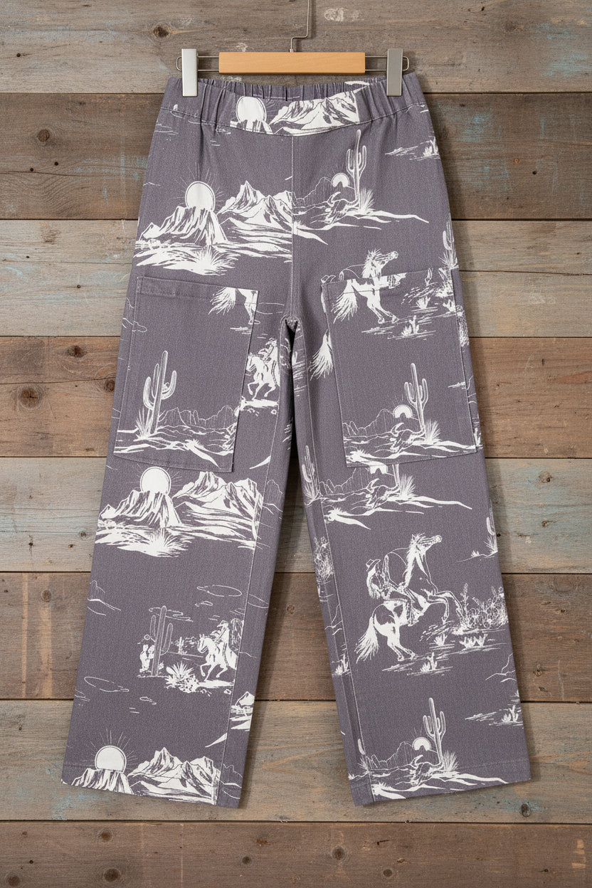 womens cowboy capris on a hanger against a wood background