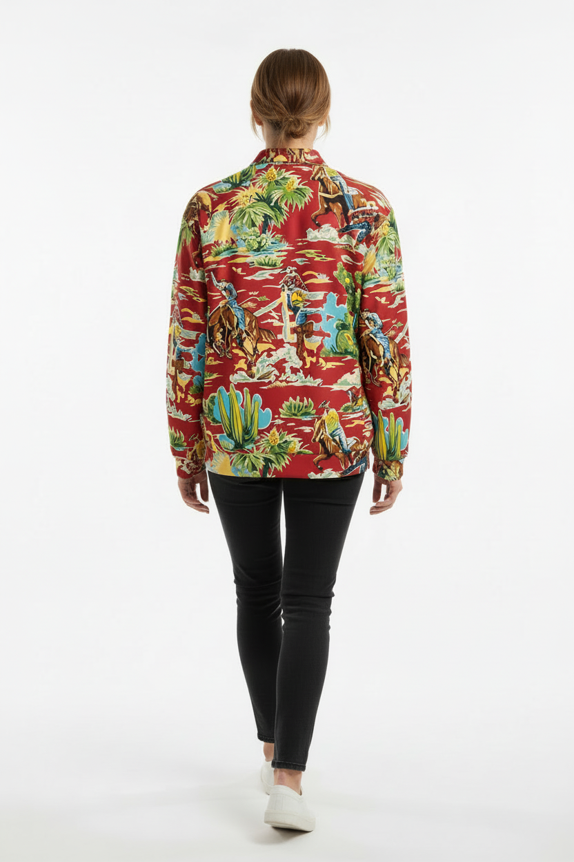 Colorful shirt with cowboy and nature pattern on a red background