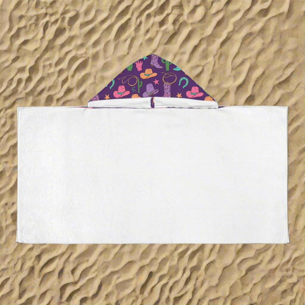 Cowgirl Hooded Towel for Kids – Personalized Western Towel in Pink, Purple & Turquoise
✓ FREE shipping on orders $35+
✓ Printed in the USA – usually arrives in 5–8 business days

Y’all ready for the cutest towel in the wild west? 🤠💖 This Cowgirl Hooded Towel features a vibrant mix of pink, purple, turquoise, and gold with adorable cowgirl hats, boots, cacti, stars, and lucky horseshoes. Whether it’s for the bath, pool, or beach, your little cowgirl will be wrapped in cozy comfort and western magic.

✓ Lin