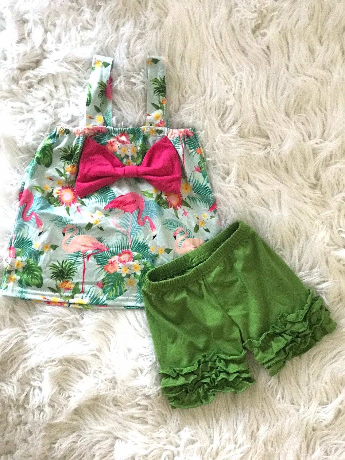 Toddler Flamingo Shirt & Ruffle Shorts Set | Girls’ Flamingo Boutique Outfit 🌸🦩

Bring on summer vibes with this adorable Flamingo Tank Top & Green Ruffle Shorts Set! Featuring a bright pink flamingo with a big bow and matching ruffled shorts, this set is perfect for your little fashionista.

✔ Fun & Stylish: The perfect toddler boutique outfit for summer adventures, vacations, or everyday cuteness!
✔ Soft & Stretchy: 
✔ Limited Stock – Only $15!
