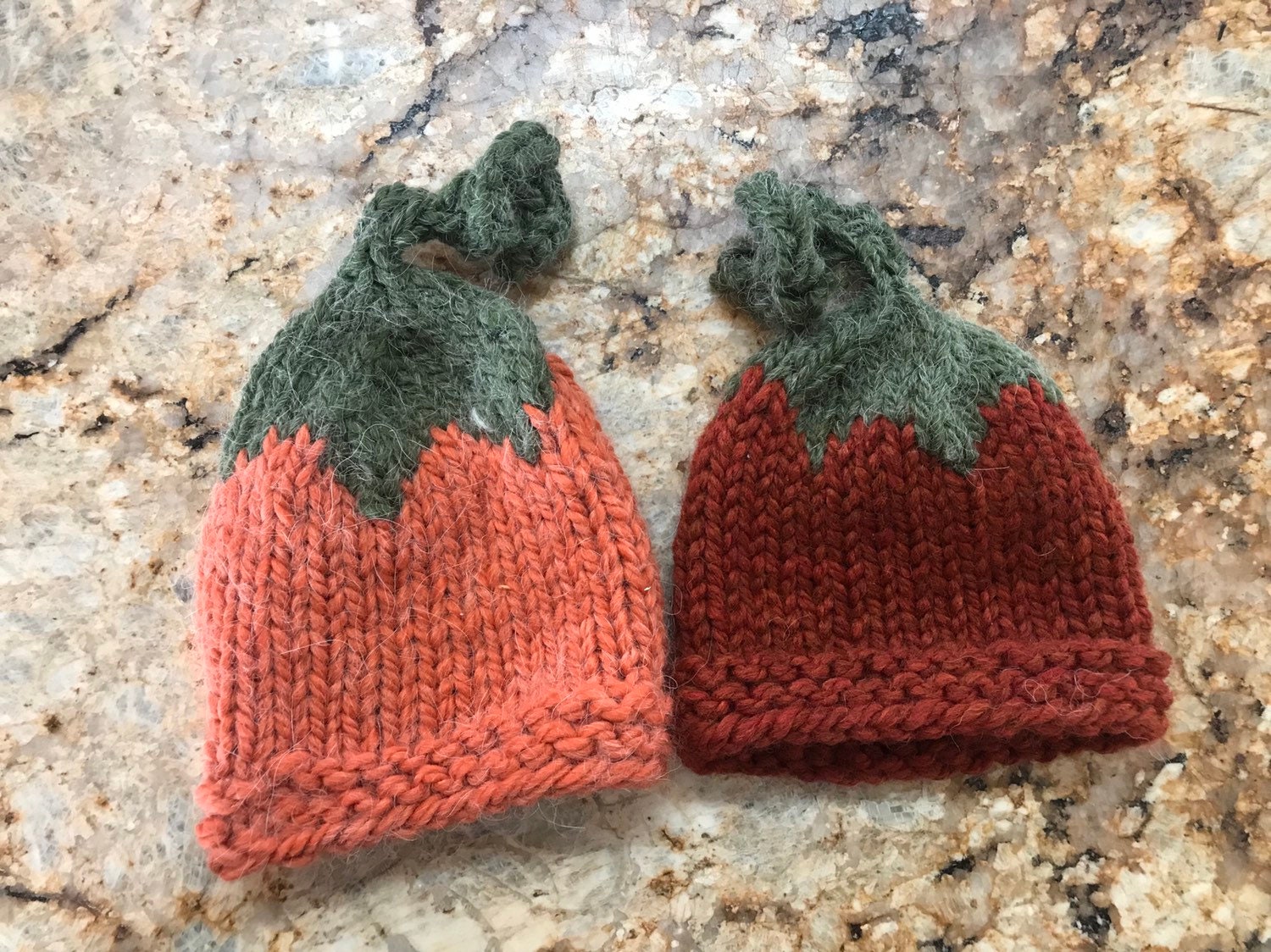 Handknit pumpkin hats come in pumpkin or spice or both!